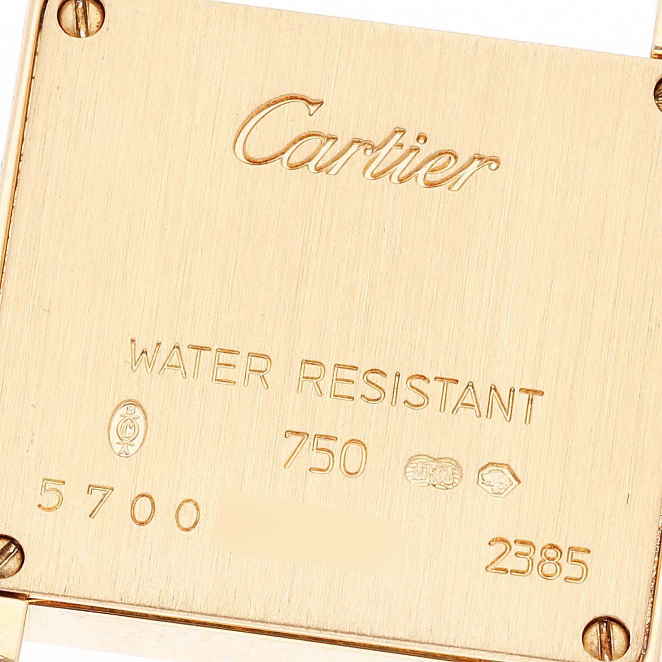 This image shows the back case of a Cartier Tank Française watch, highlighting the brand name, model, and water resistance details.
