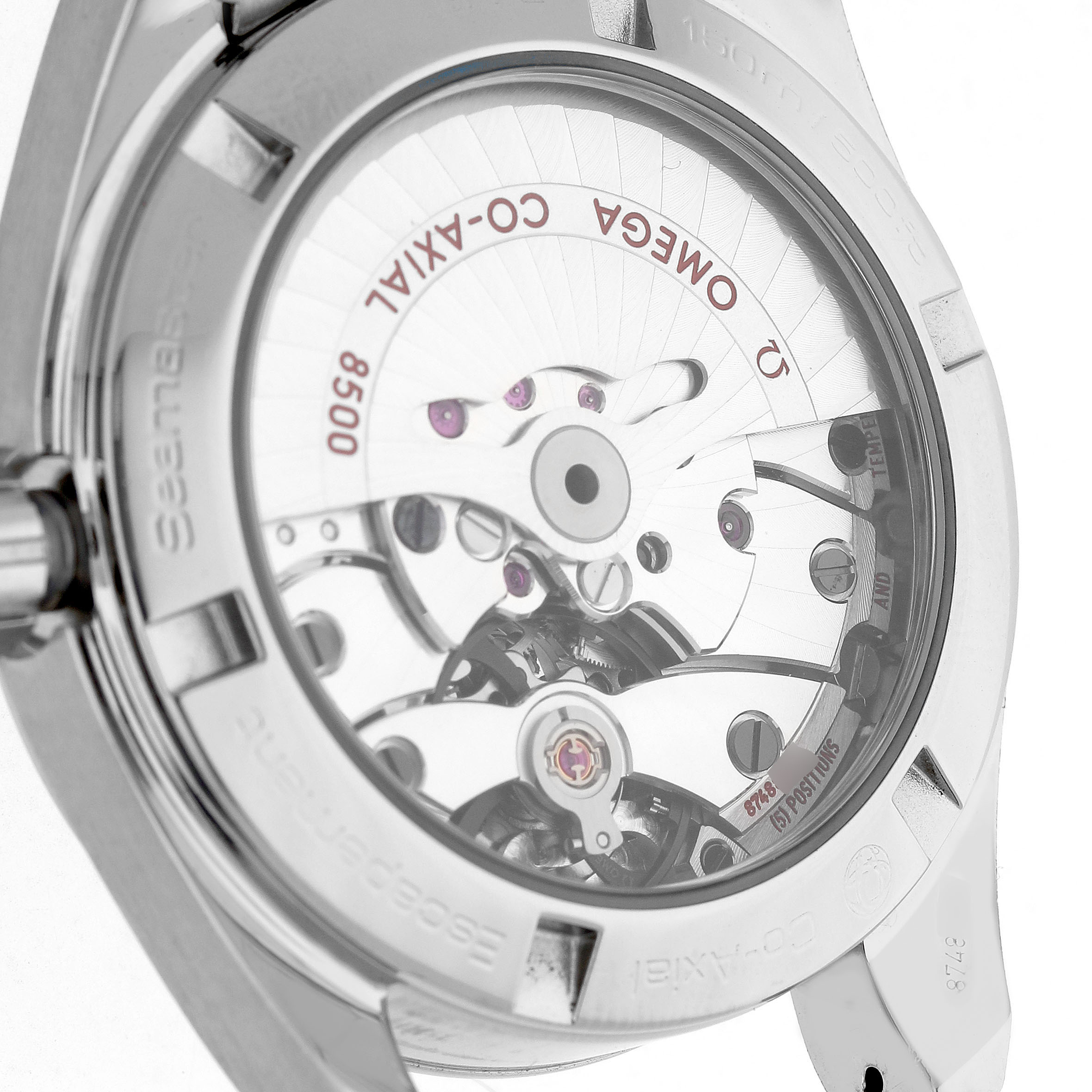 The image shows the back view of an Omega Seamaster 231.10.39.21.54.001 Men's Stainless Steel White Dial, exposing the intricate movement and co-axial mechanism.