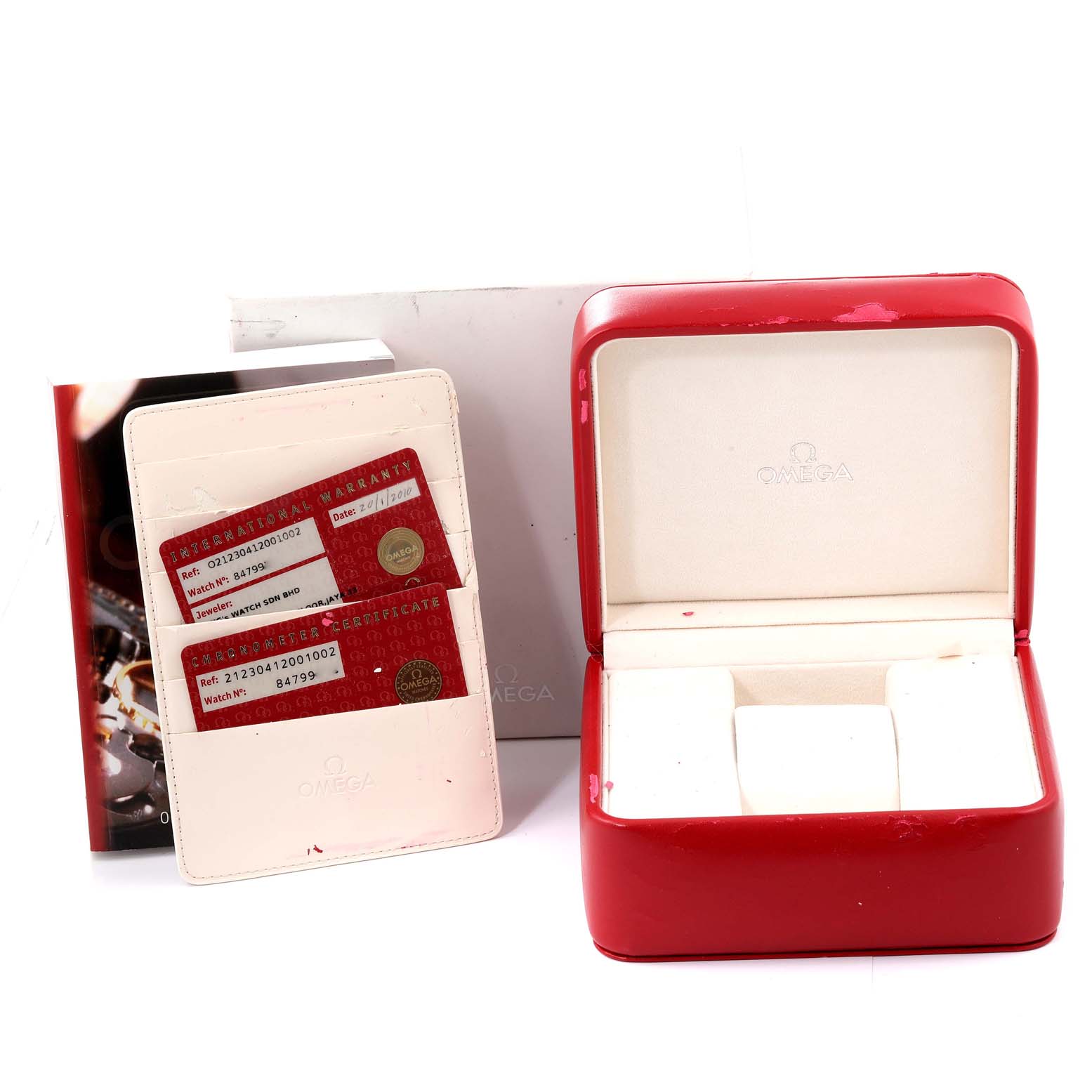 The image features accessories for an Omega Seamaster 212.30.41.20.01.002 Men's Stainless Steel Black Dial 212.30.41.20.01.002 Men's Stainless Steel Black Dial watch, including a red case, warranty cards, and a booklet.