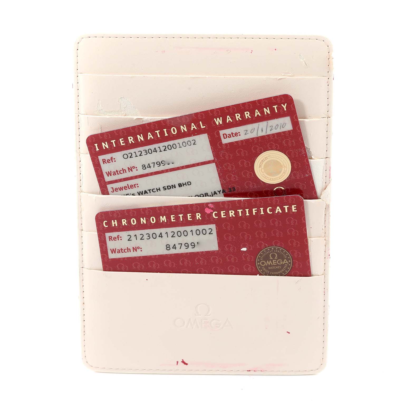 The image shows an Omega Seamaster 212.30.41.20.01.002 Men's Stainless Steel Black Dial 212.30.41.20.01.002 Men's Stainless Steel Black Dial model's international warranty and chronometer certificate cards in a holder.