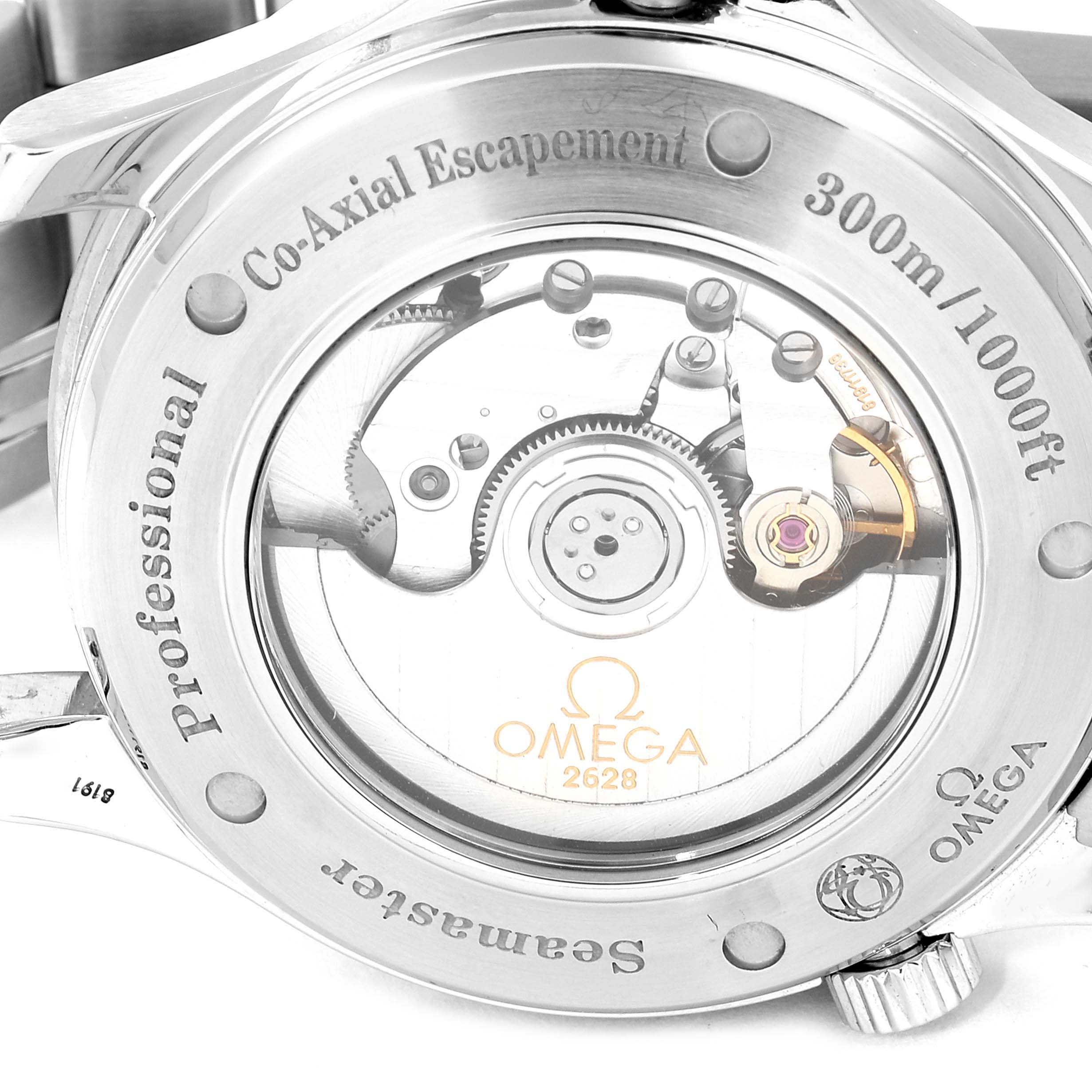 The image shows the back of an Omega Seamaster 2535.80.00 Men's Stainless Steel Blue Dial 2535.80.00 Men's Stainless Steel Blue Dial watch, highlighting the Co-Axial Escapement and inner mechanics.