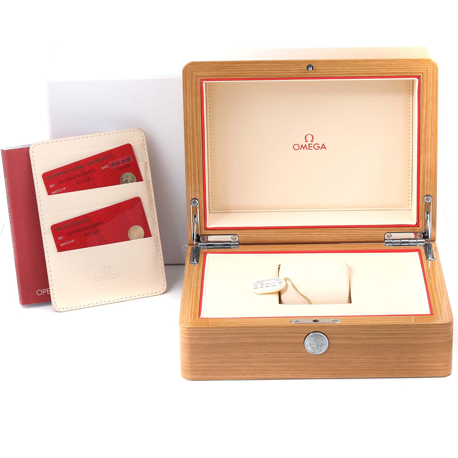 The image shows an open wooden watch box and warranty cards for Omega Speedmaster 331.90.42.51.04.001 Men's Titanium White Dial 331.90.42.51.04.001 Men's Titanium White Dial.