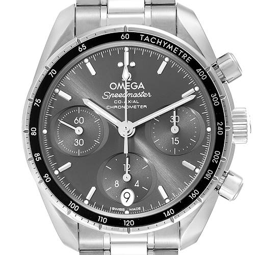 The Omega Speedmaster watch is shown from a front angle, highlighting the dial, bezel, and stainless steel bracelet.