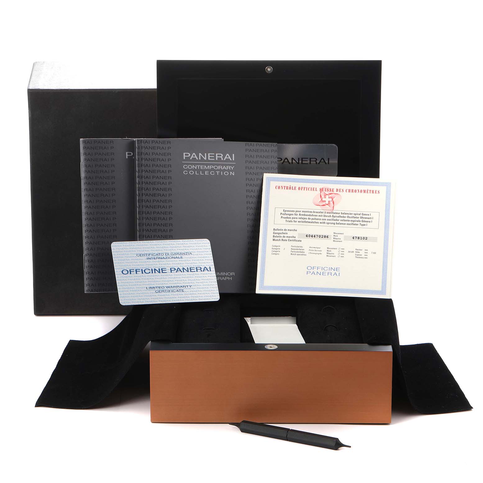 The image shows packaging and documents for the Panerai Luminor PAM00310 Men's Stainless Steel Black Dial PAM00310 Men's Stainless Steel Black Dial, including a box, manuals, certificates, and a tool.