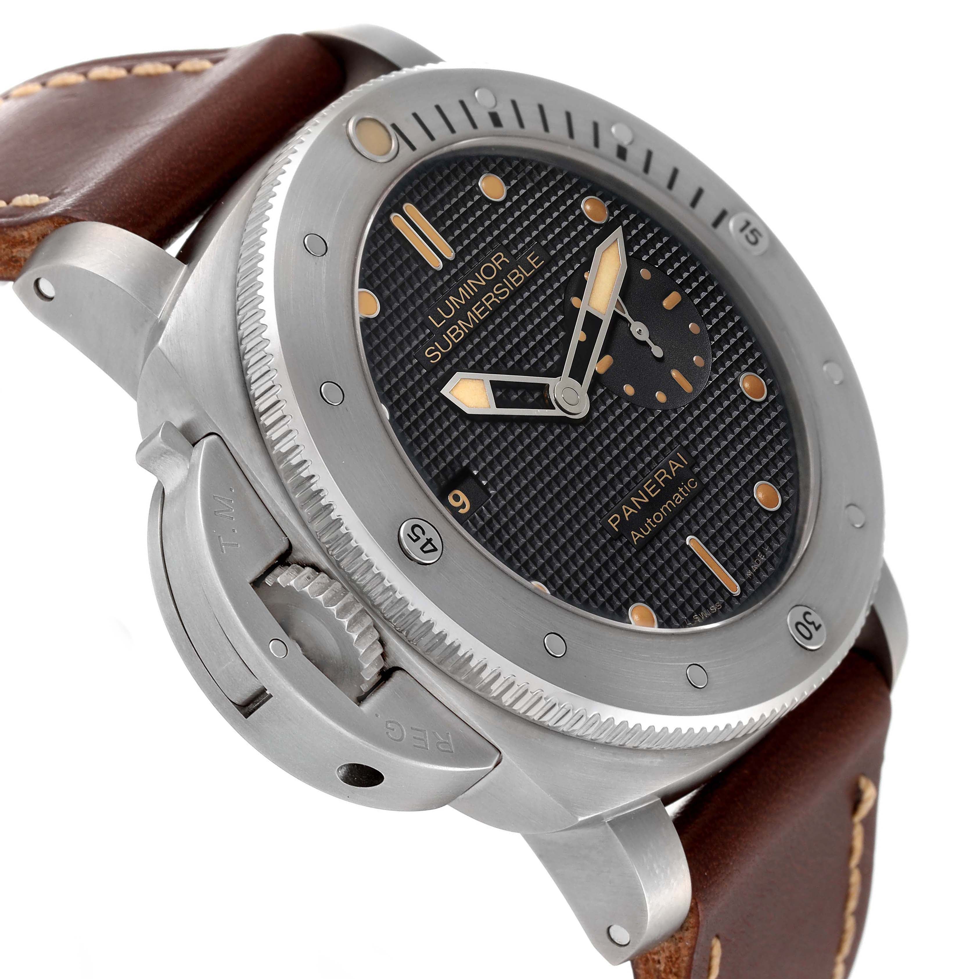 The image shows a Panerai Luminor Submersible watch at an angle highlighting the dial, bezel, crown guard, and leather strap.