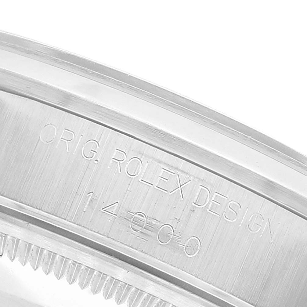 This image shows a close-up of the engraved bezel with the serial number of the Rolex Air-King 14000 Men's Stainless Steel Blue Dial 14000 Men's Stainless Steel Blue Dial watch.