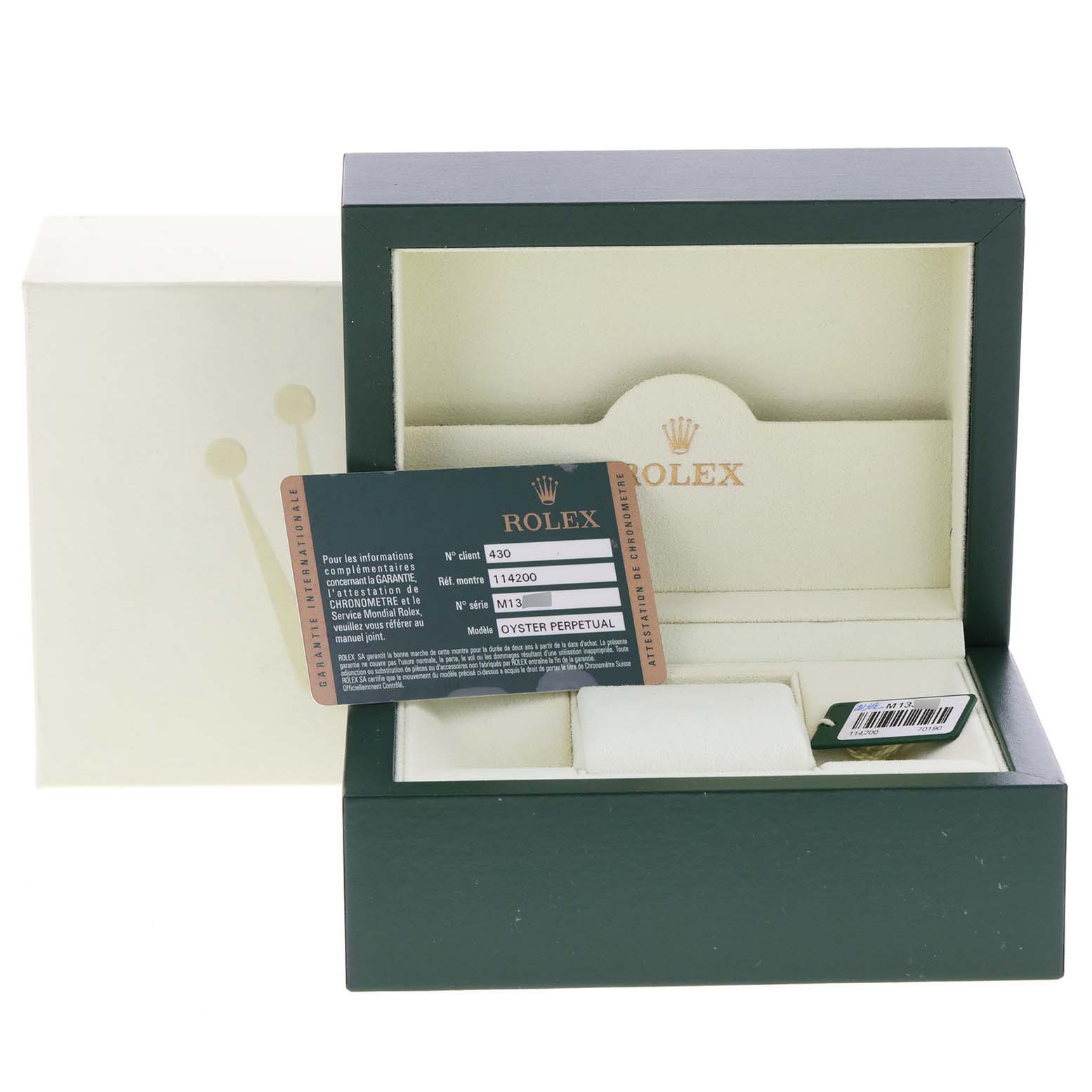 The image shows an open Rolex Air-King 114200 Men's Stainless Steel Silver Dial 114200 Men's Stainless Steel Silver Dial watch box, displaying the interior and certification card.