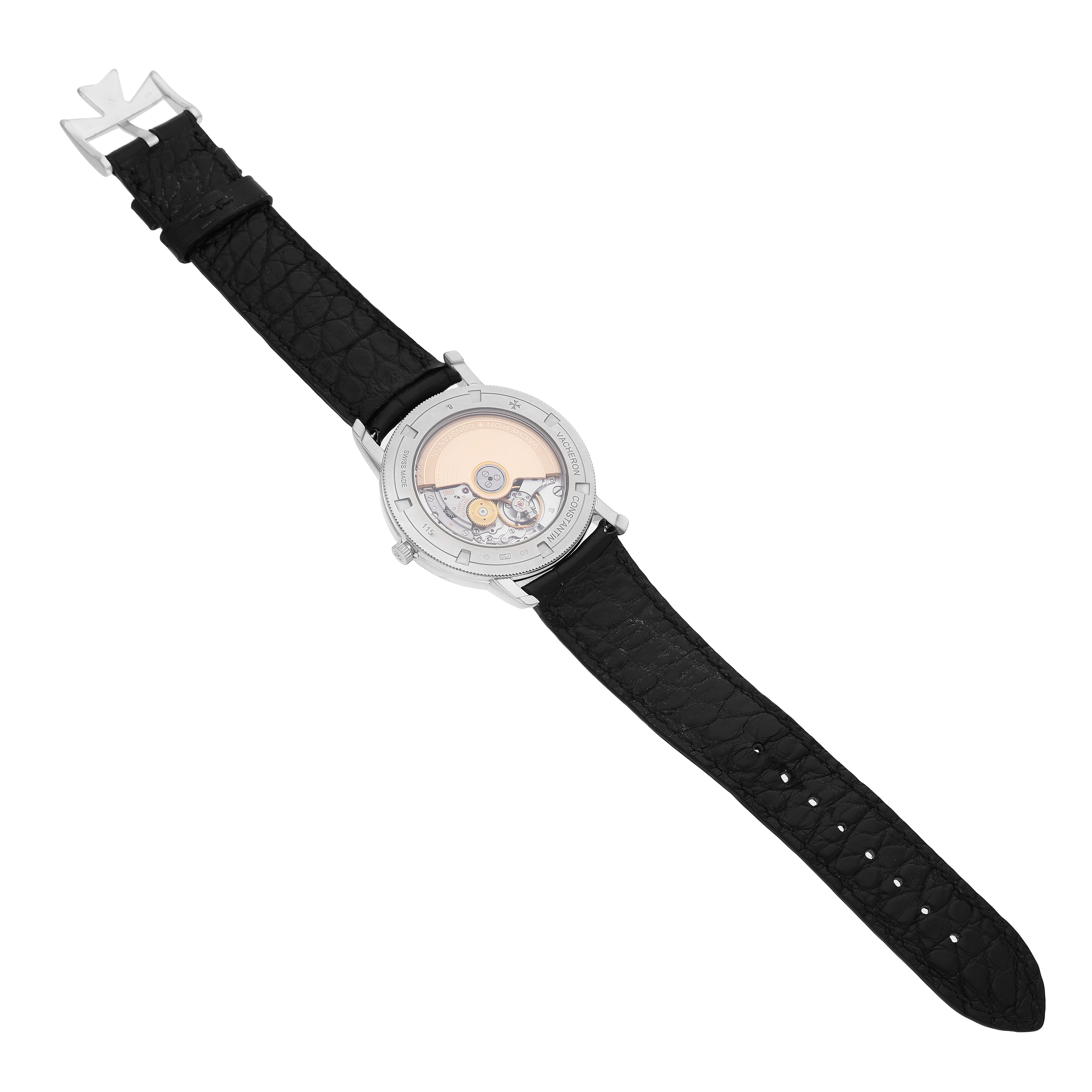 The Vacheron Constantin Traditionnelle 87172/000G-9301 Men's White Gold Silver Dial watch is shown from the back, revealing the movement and black leather strap.