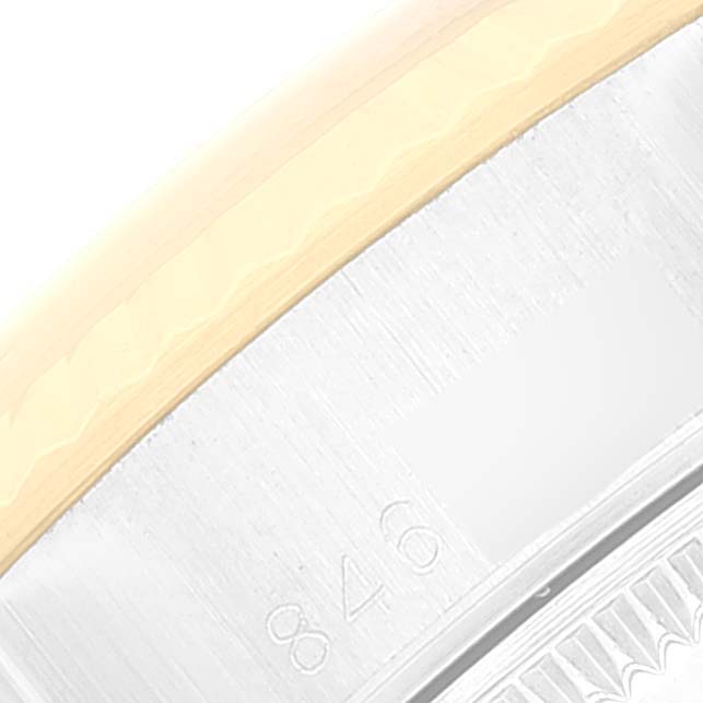 The image shows a close-up angle of the side and inner casing of a Rolex Datejust 69173 Women's Steel and Gold (two tone) White Dial 69173 Women's Steel and Gold (two tone) White Dial watch.