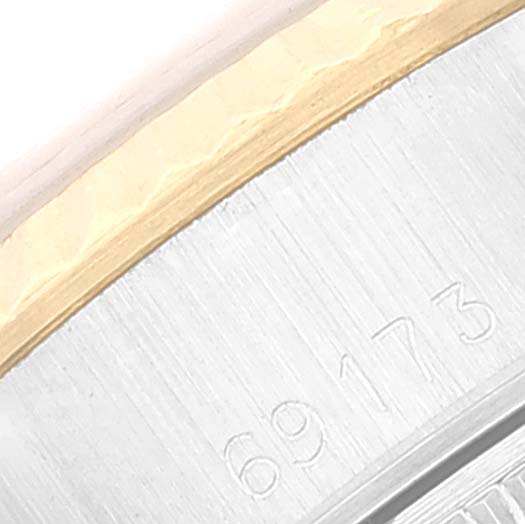 The image shows a close-up of the model number and bezel of a Rolex Datejust 69173 Women's Steel and Gold (two tone) White Dial 69173 Women's Steel and Gold (two tone) White Dial watch.