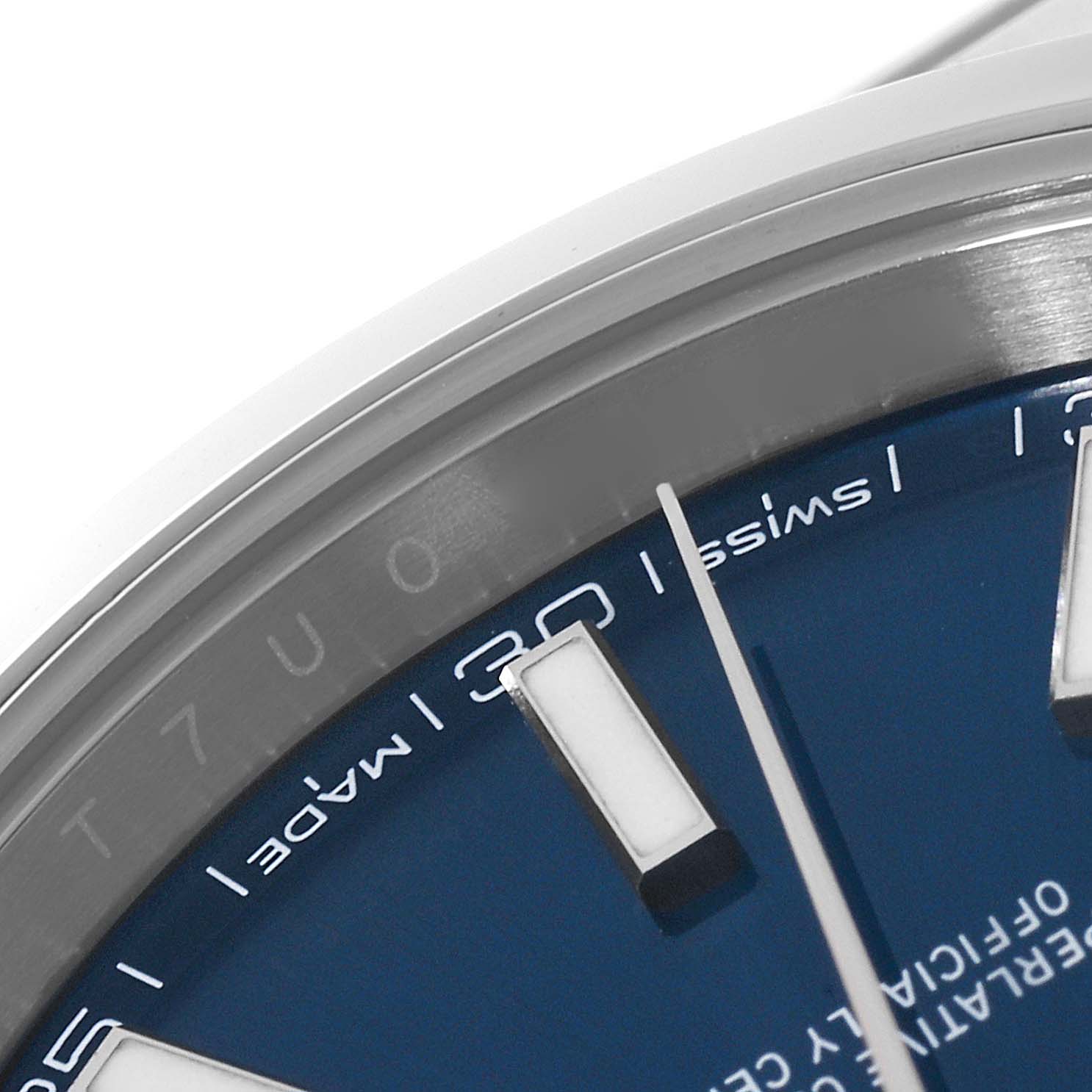 This close-up image shows the bezel, part of the blue dial with markers, and the "Swiss Made" inscription of the Rolex Datejust 41 126300 Men's Stainless Steel Blue Dial 126300 Men's Stainless Steel Blue Dial.