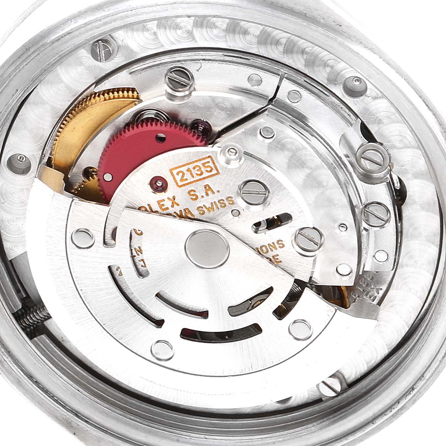 This image shows a detailed view of the movement and inner mechanism of a Rolex Mid-Size 68274 Women
s Stainless Steel Silver Dial 68274 Women
s Stainless Steel Silver Dial watch.