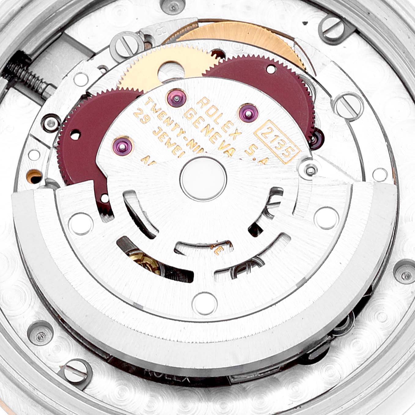 The image shows a close-up view of the movement mechanism of a Rolex Mid-Size 68273 Women
s Steel and Gold (two tone) Champagne Dial 68273 Women
s Steel and Gold (two tone) Champagne Dial watch.
