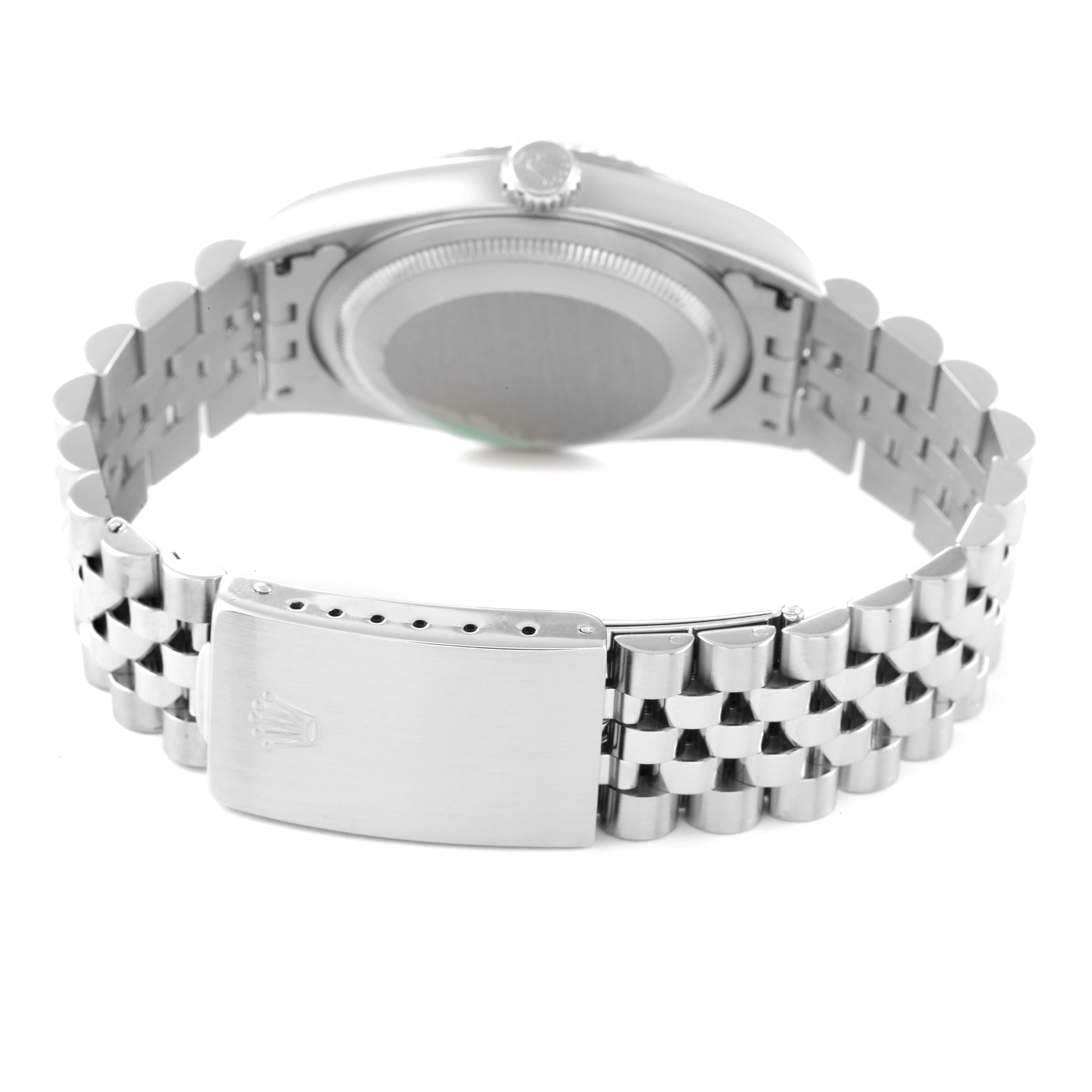 The image shows the back view of a Rolex Datejust 16234 Men's Stainless Steel Black Dial 16234 Men's Stainless Steel Black Dial watch, focusing on the case back and stainless steel bracelet clasp.