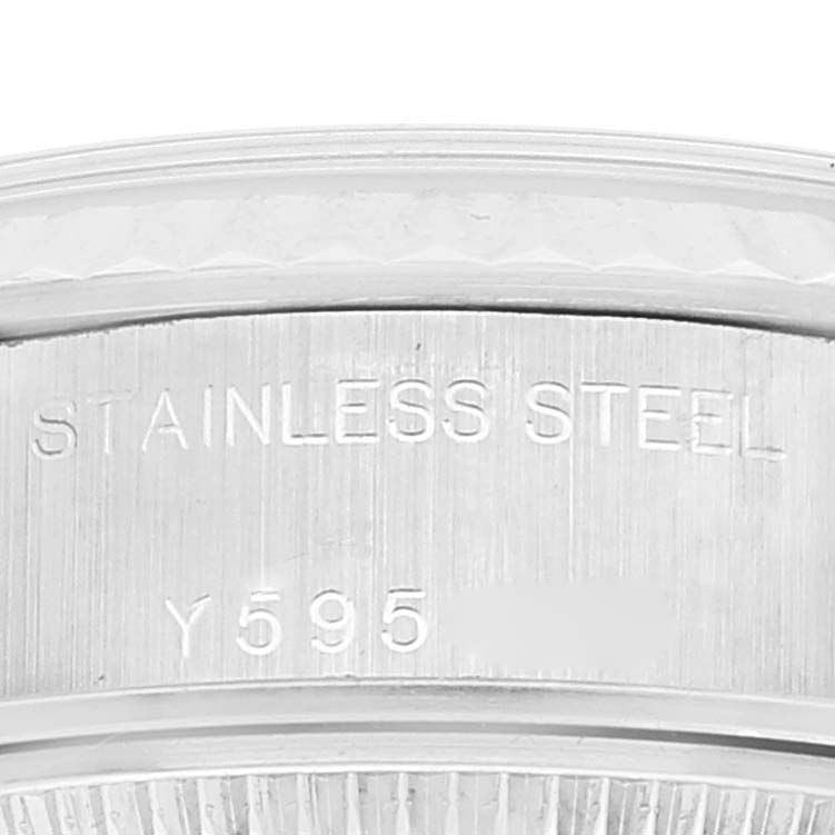 The image shows a close-up of the stainless steel case back of a Rolex Datejust 79174 Women's Stainless Steel Silver Dial 79174 Women's Stainless Steel Silver Dial watch.