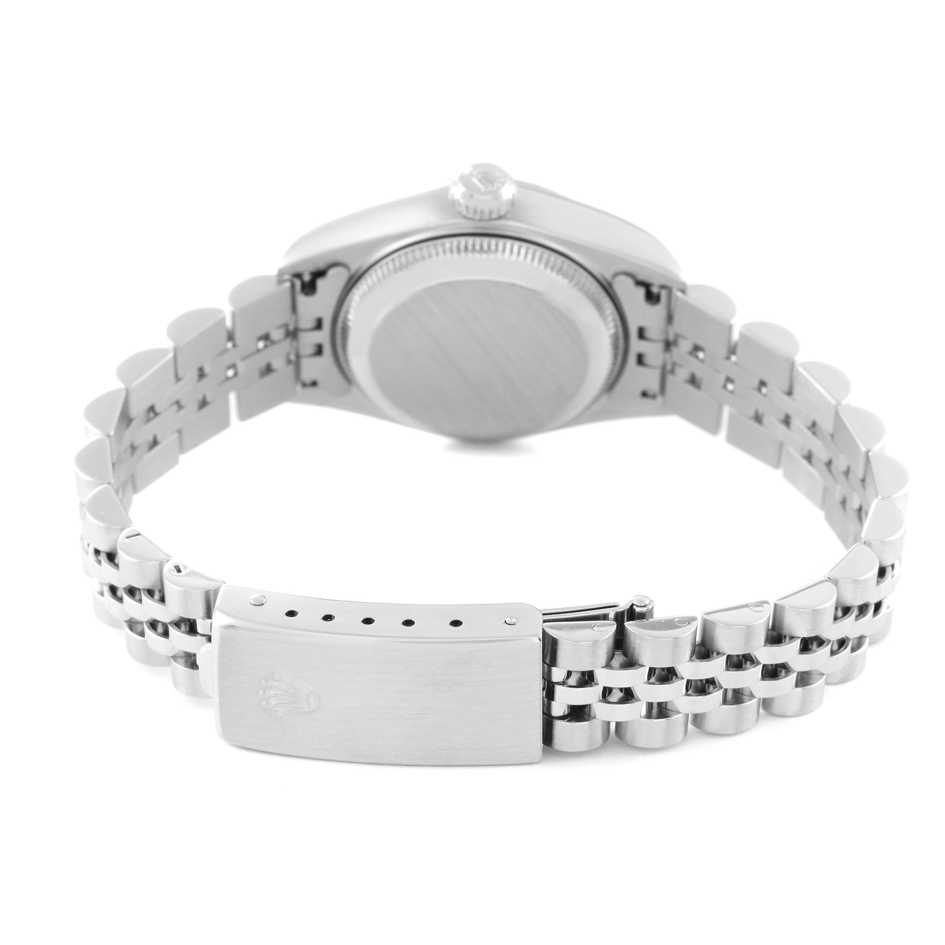 The image shows the back of the Rolex Datejust 79174 Women's Stainless Steel Silver Dial 79174 Women's Stainless Steel Silver Dial watch, including its clasp and bracelet.