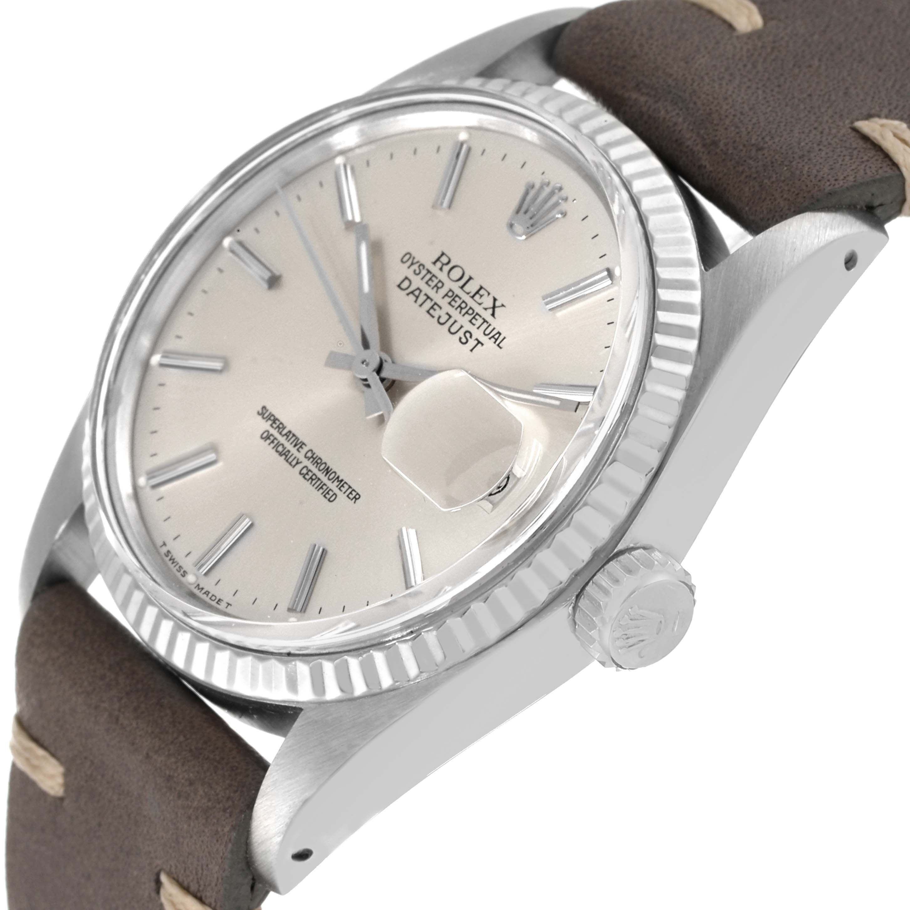 The Rolex Datejust 16014 Men's Steel and Gold (two tone) Silver Dial 16014 Men's Steel and Gold (two tone) Silver Dial watch is shown at a slight angle, displaying the bezel, dial, crown, and part of the strap.