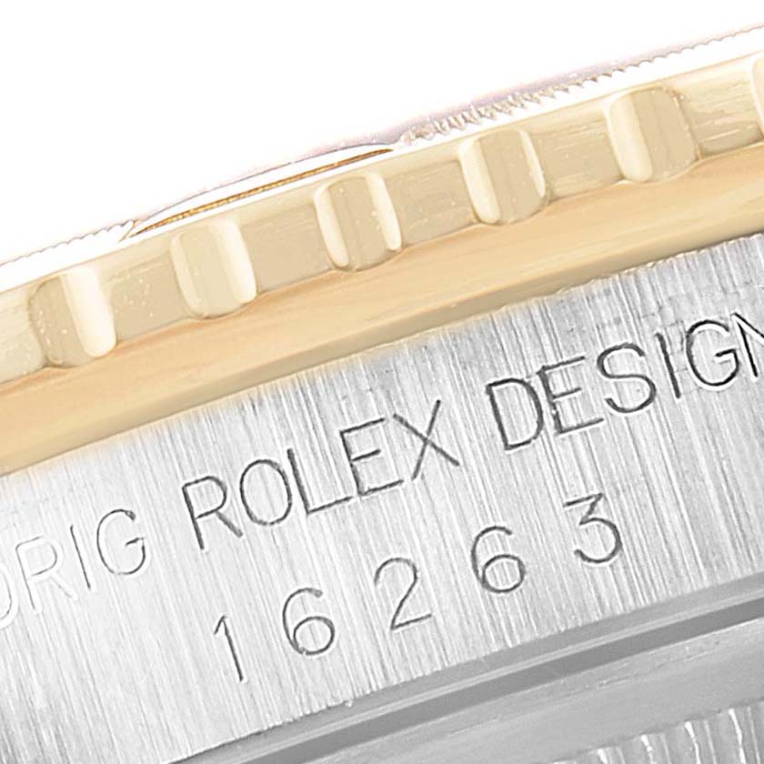 This image shows a close-up angle of the bezel edge and case side with engravings of the Rolex Turn-o-Graph 16263 Men
s Steel and Gold (two tone) Champagne Dial 16263 Men
s Steel and Gold (two tone) Champagne Dial model.