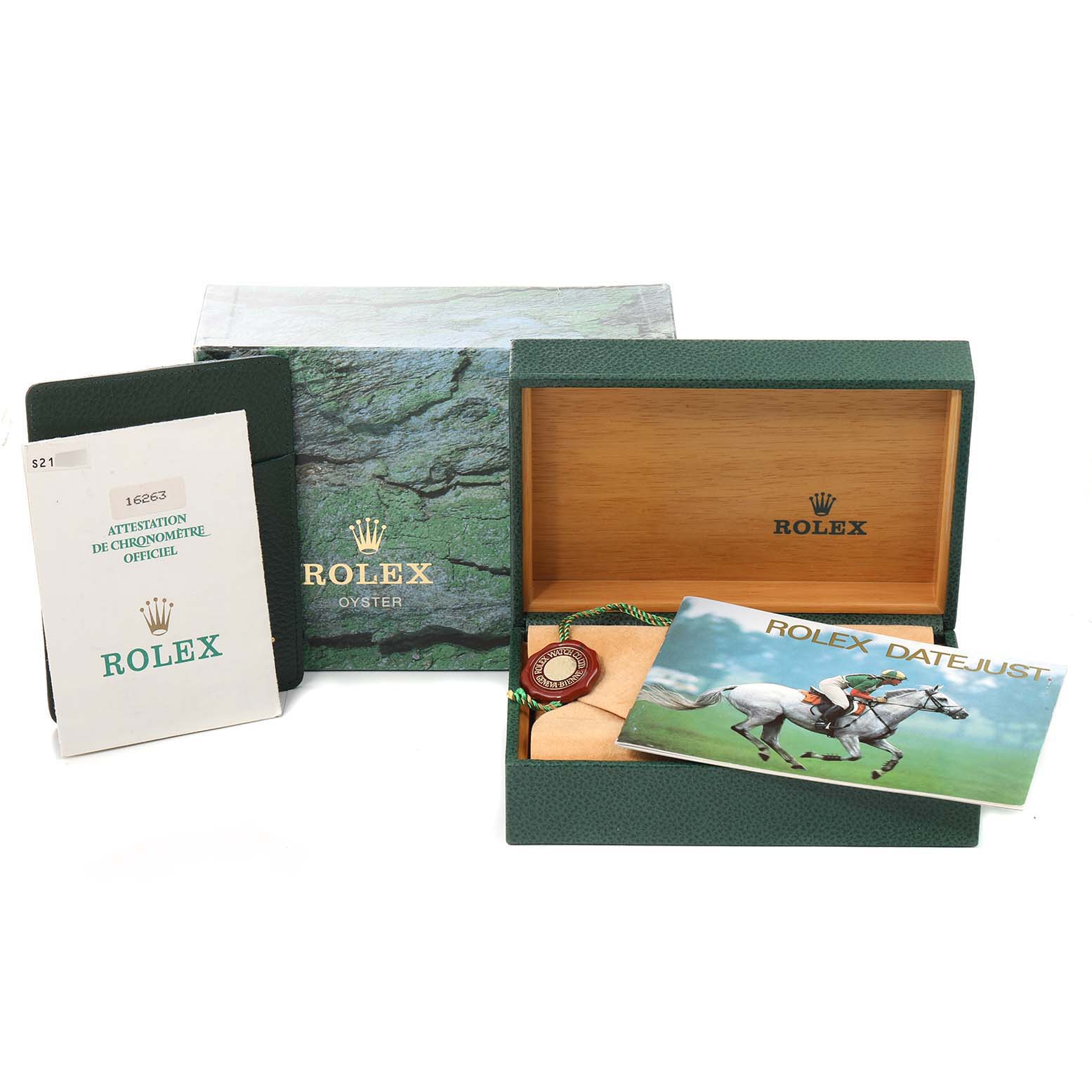 The image shows an open Rolex Turn-o-Graph 16263 Men
s Steel and Gold (two tone) Champagne Dial 16263 Men
s Steel and Gold (two tone) Champagne Dial box with manual, papers, and accessories.