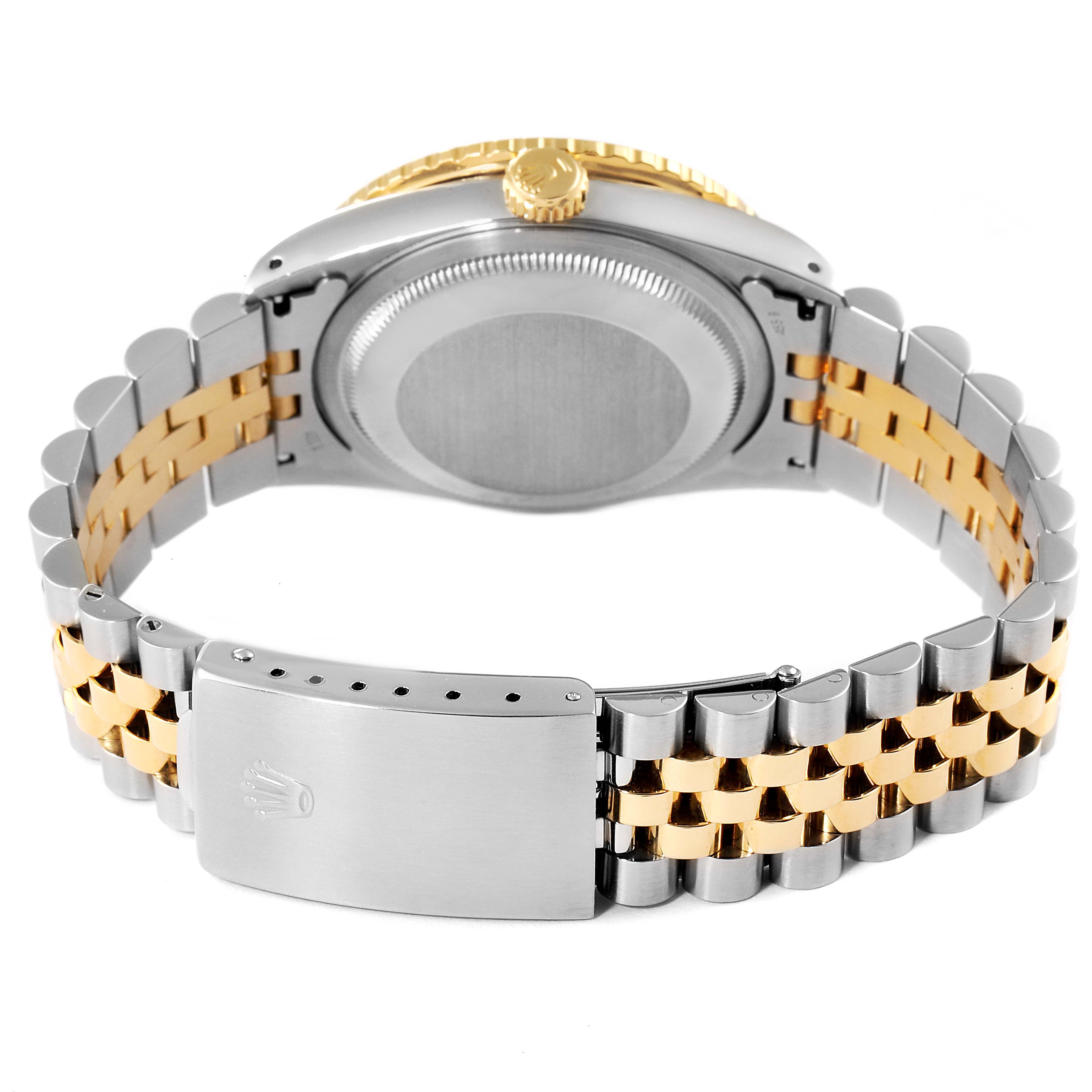 This image shows the back case and bracelet of a Rolex Turn-o-Graph 16263 Men
s Steel and Gold (two tone) Champagne Dial 16263 Men
s Steel and Gold (two tone) Champagne Dial watch from a rear angle.