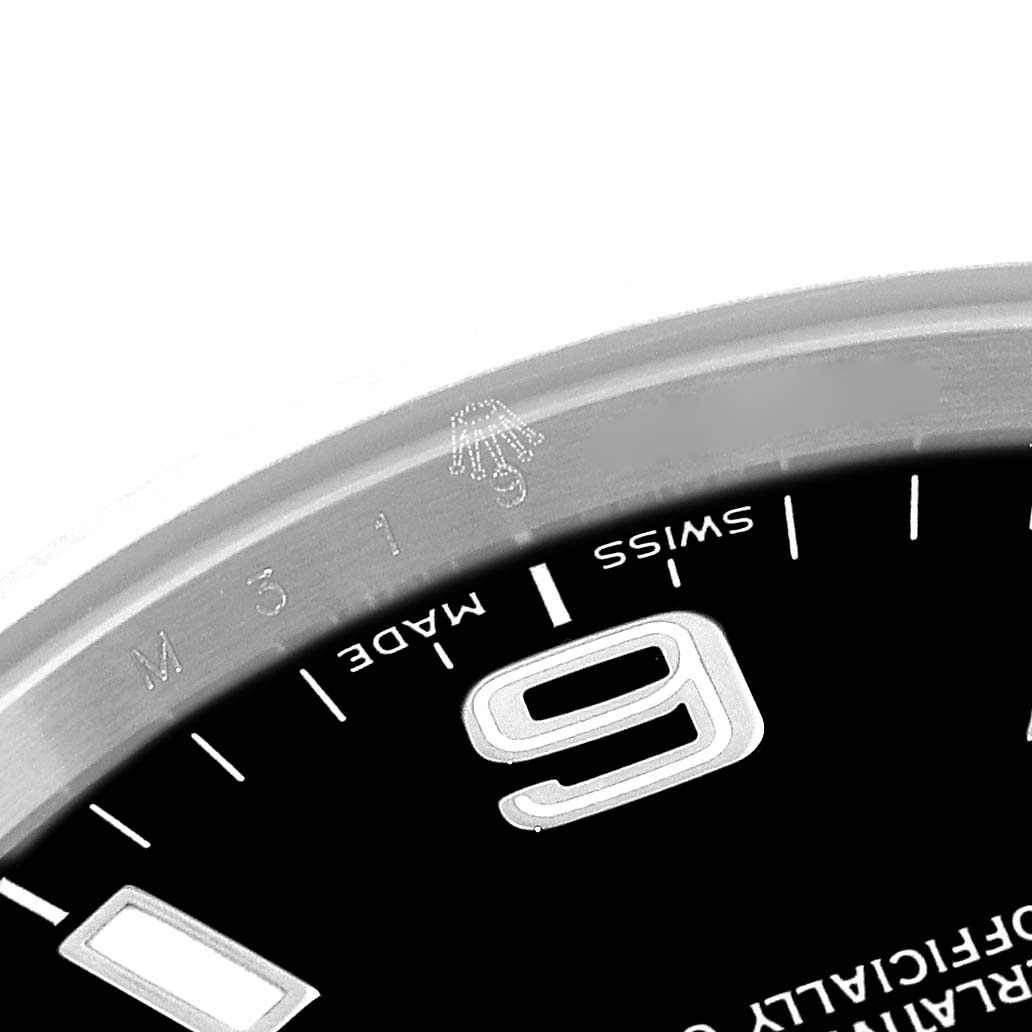 The image shows a close-up of the dial and part of the bezel of a Rolex Explorer 114270 Men's Stainless Steel Black Dial 114270 Men's Stainless Steel Black Dial watch.