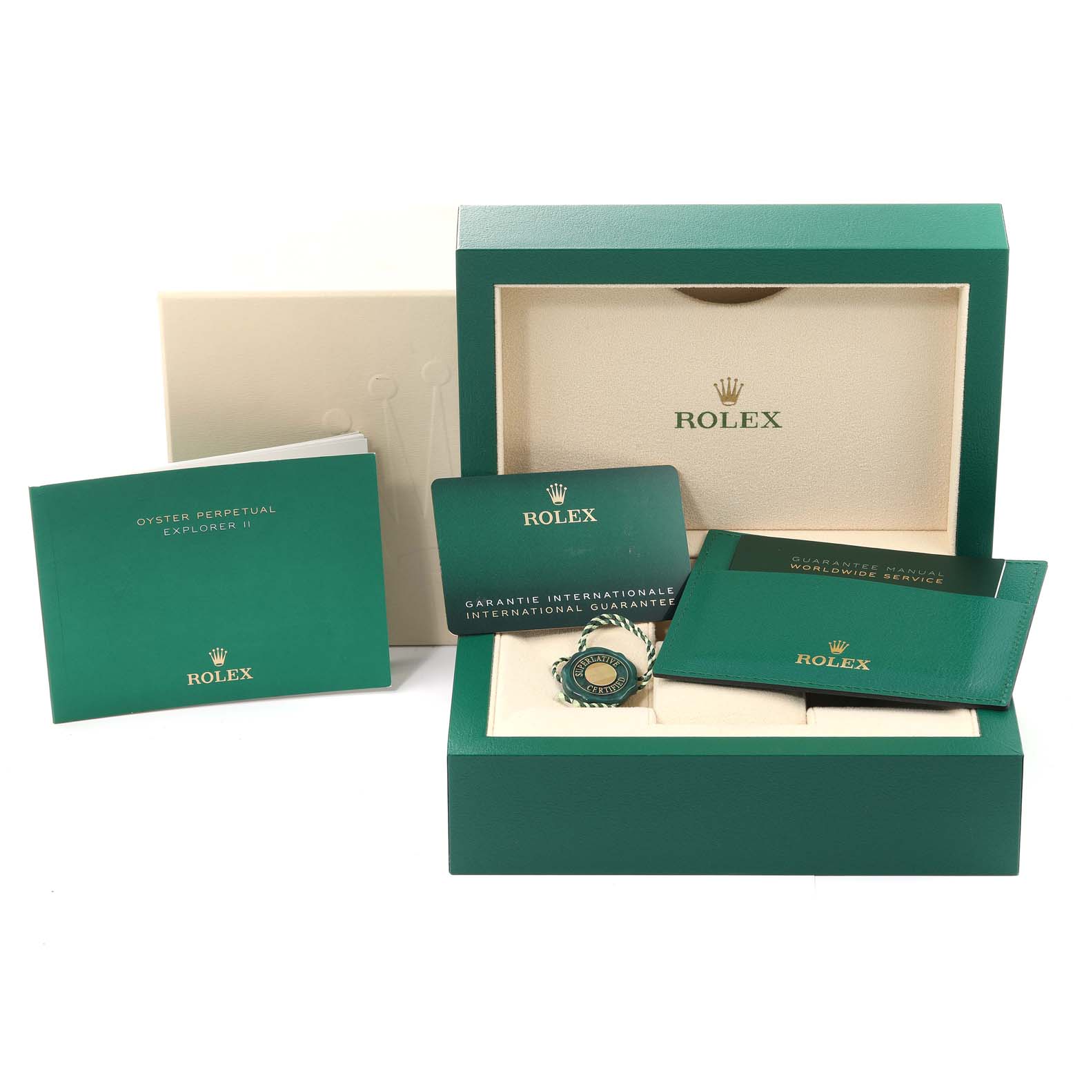 The image shows a Rolex Explorer 226570 Men's Stainless Steel White Dial 226570 Men's Stainless Steel White Dial watch box containing booklets, a warranty card, and a tag from a front angle.