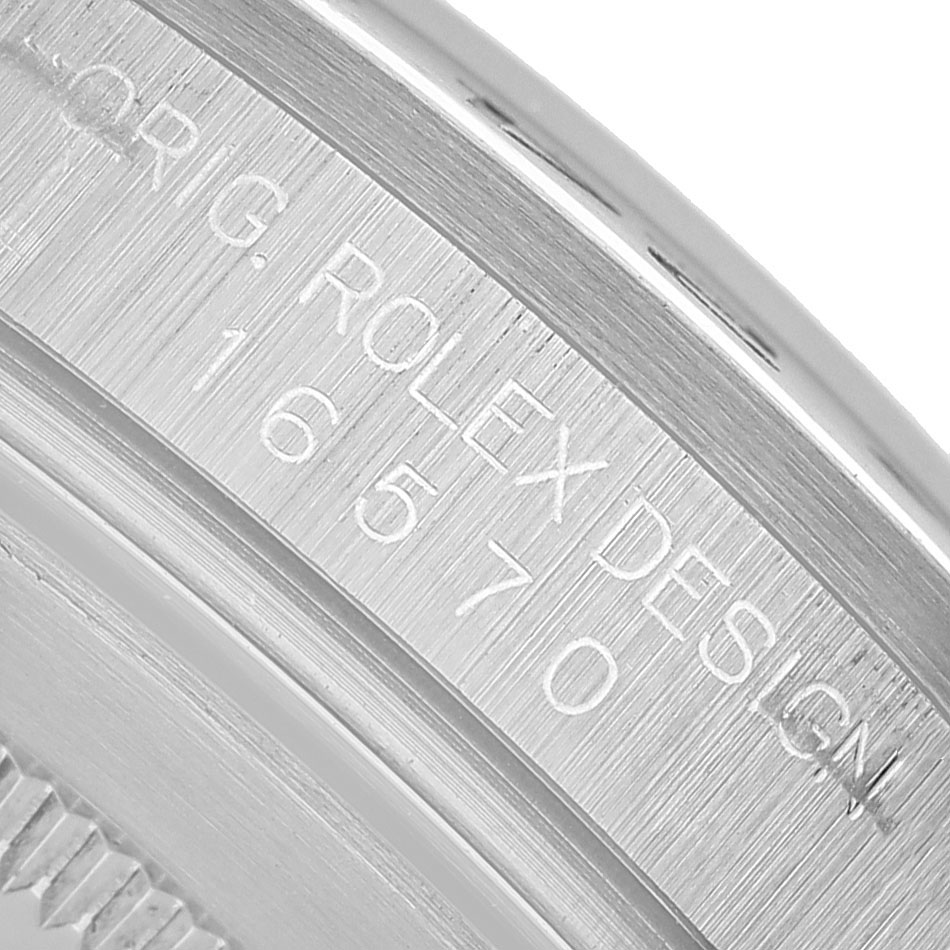 The image shows a close-up of the case side, displaying the model number engraving of the Rolex Explorer 16570 Men's Stainless Steel White Dial.