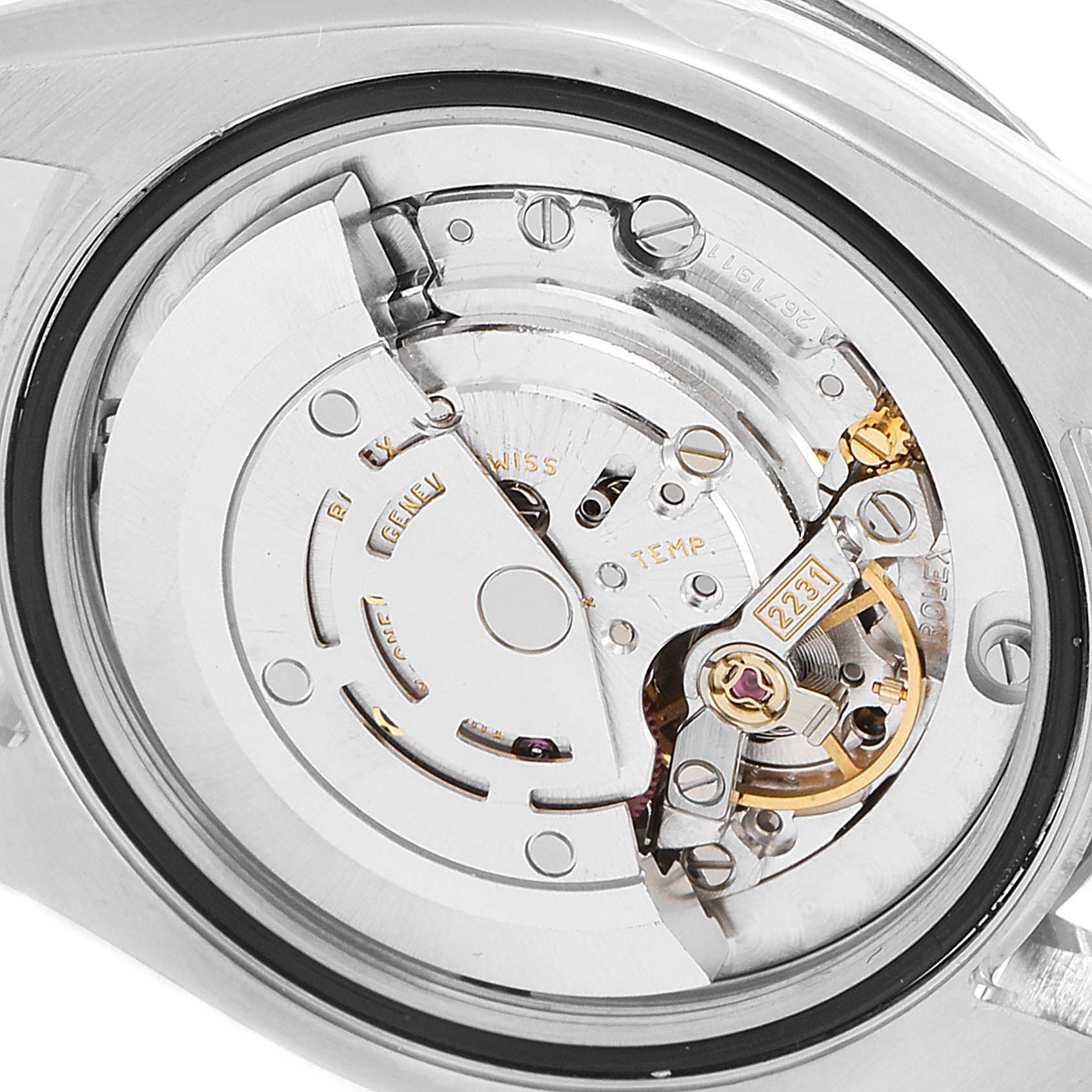 This image shows the internal mechanism of a Mid-Size Rolex watch from the back angle.