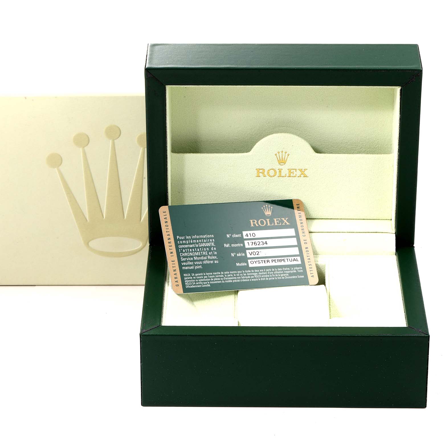 The image shows a Rolex Oyster Perpetual 176234 Women
s Stainless Steel Black Dial 176234 Women
s Stainless Steel Black Dial watch box and a warranty card, presented at an angled view.