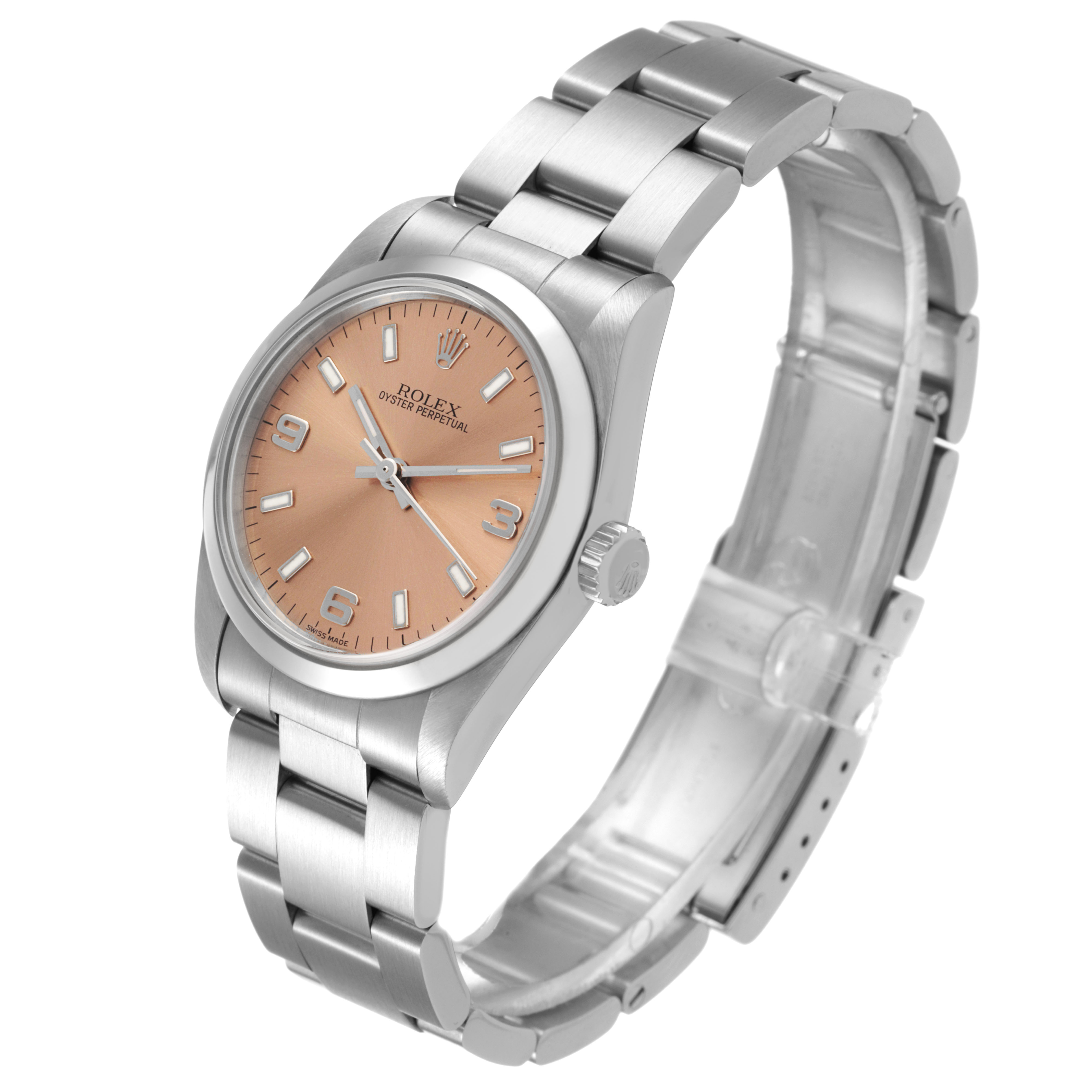 The Rolex Oyster Perpetual 77080 Women's Stainless Steel Pink Dial watch is shown from a tilted angle, highlighting the peach dial, crown, and full bracelet.