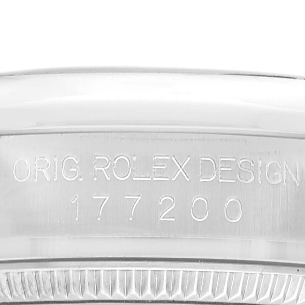 This image shows a close-up of the engraved case number on a Mid-Size Rolex watch model 177200.