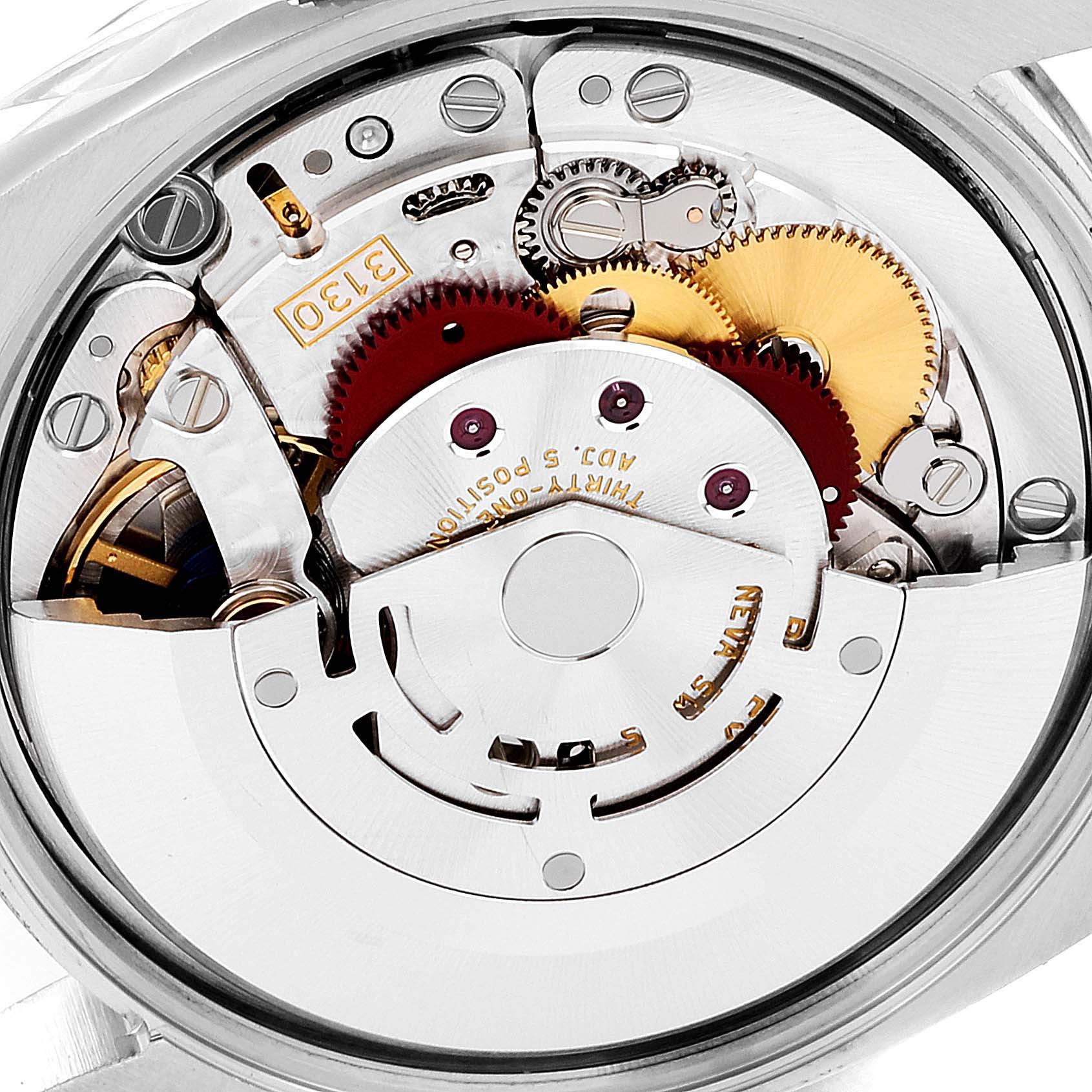 This image displays the intricate movement parts of a Rolex Oyster Perpetual 114200 Men
s Stainless Steel Green Dial 114200 Men
s Stainless Steel Green Dial watch from a rear angle.