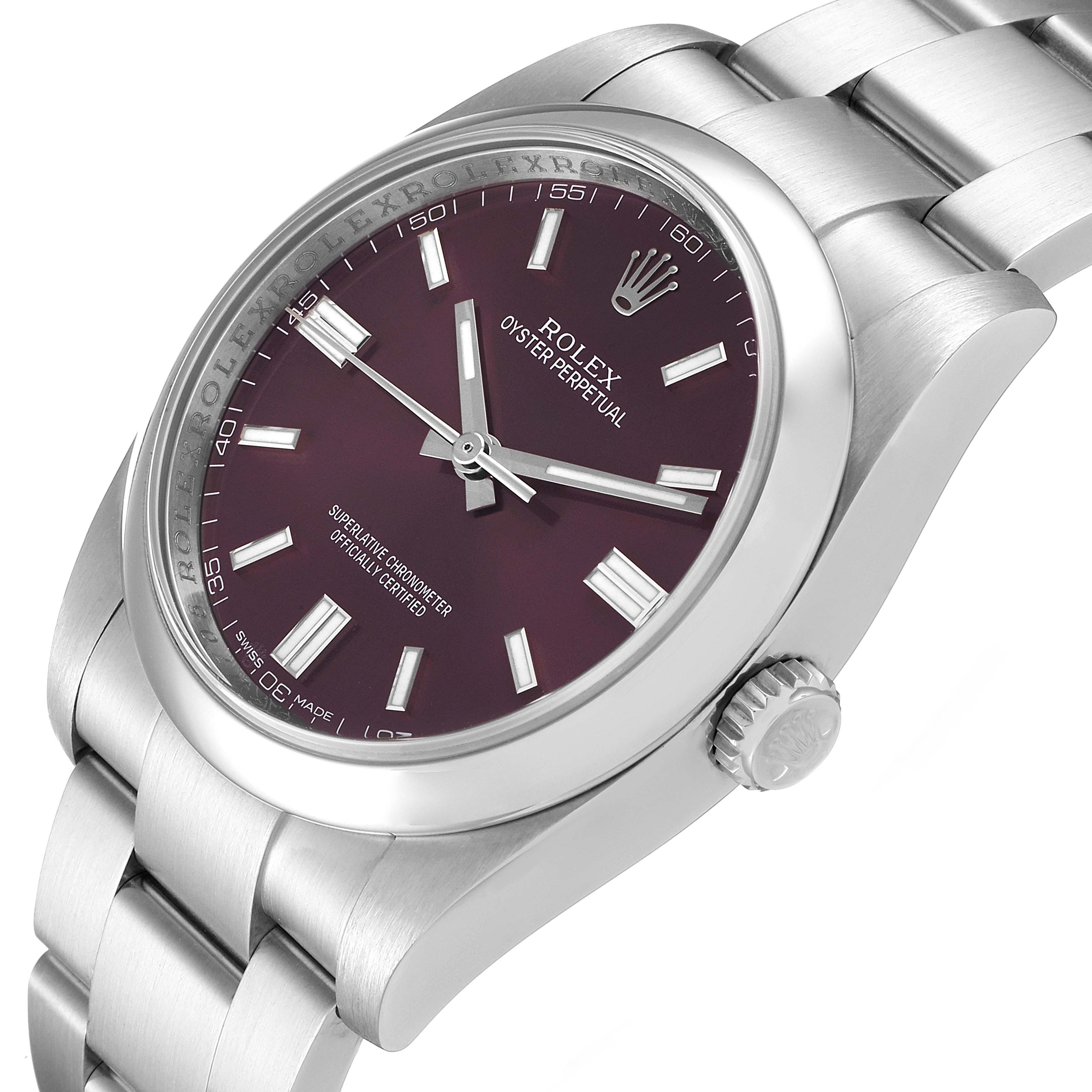 This image shows a side angle of the Rolex Oyster Perpetual 116000 Men's Stainless Steel Burgundy Dial 116000 Men's Stainless Steel Burgundy Dial, highlighting the case, crown, and a portion of the bracelet.