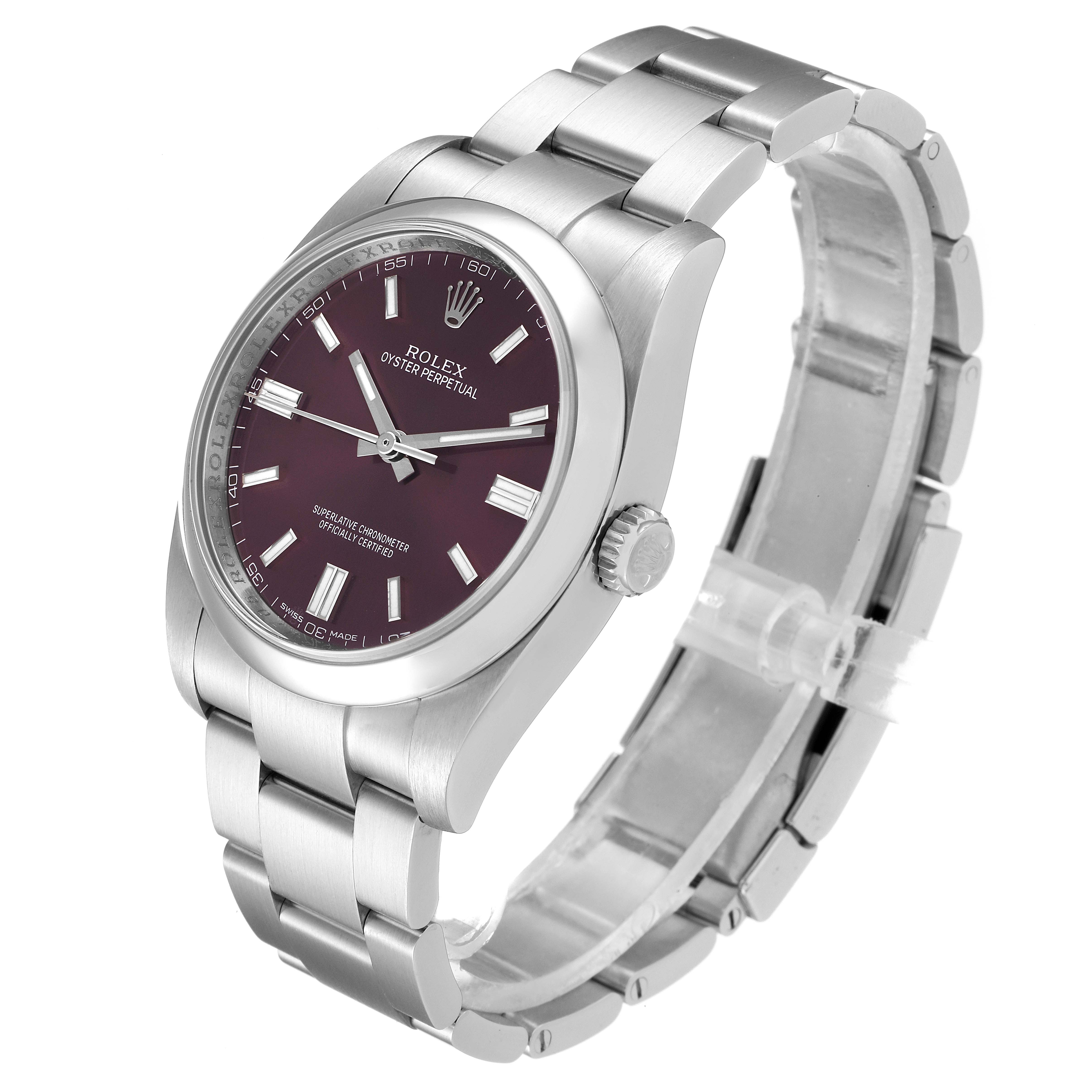 The Oyster Perpetual Rolex watch is shown from a three-quarter angle displaying the face, crown, and bracelet.