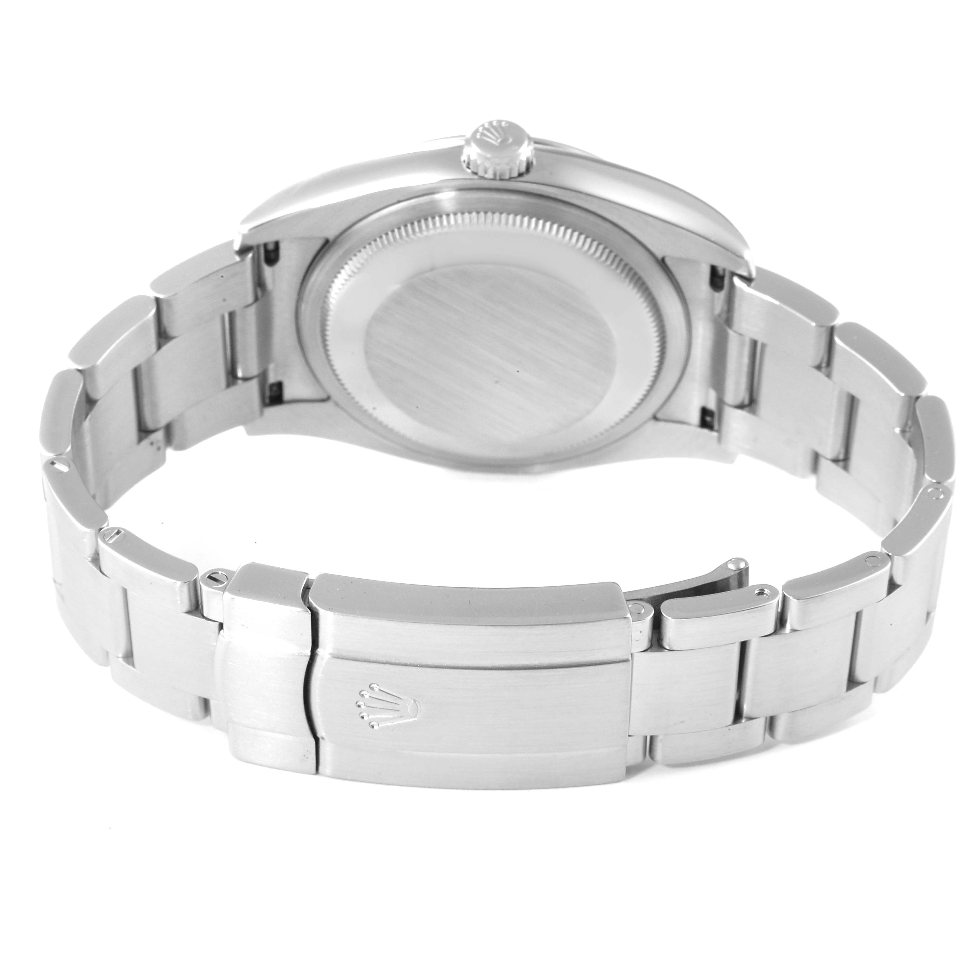 This image shows the back and clasp of a Rolex Oyster Perpetual 116000 Men
s Stainless Steel Blue Dial 116000 Men
s Stainless Steel Blue Dial watch from a rear angle.