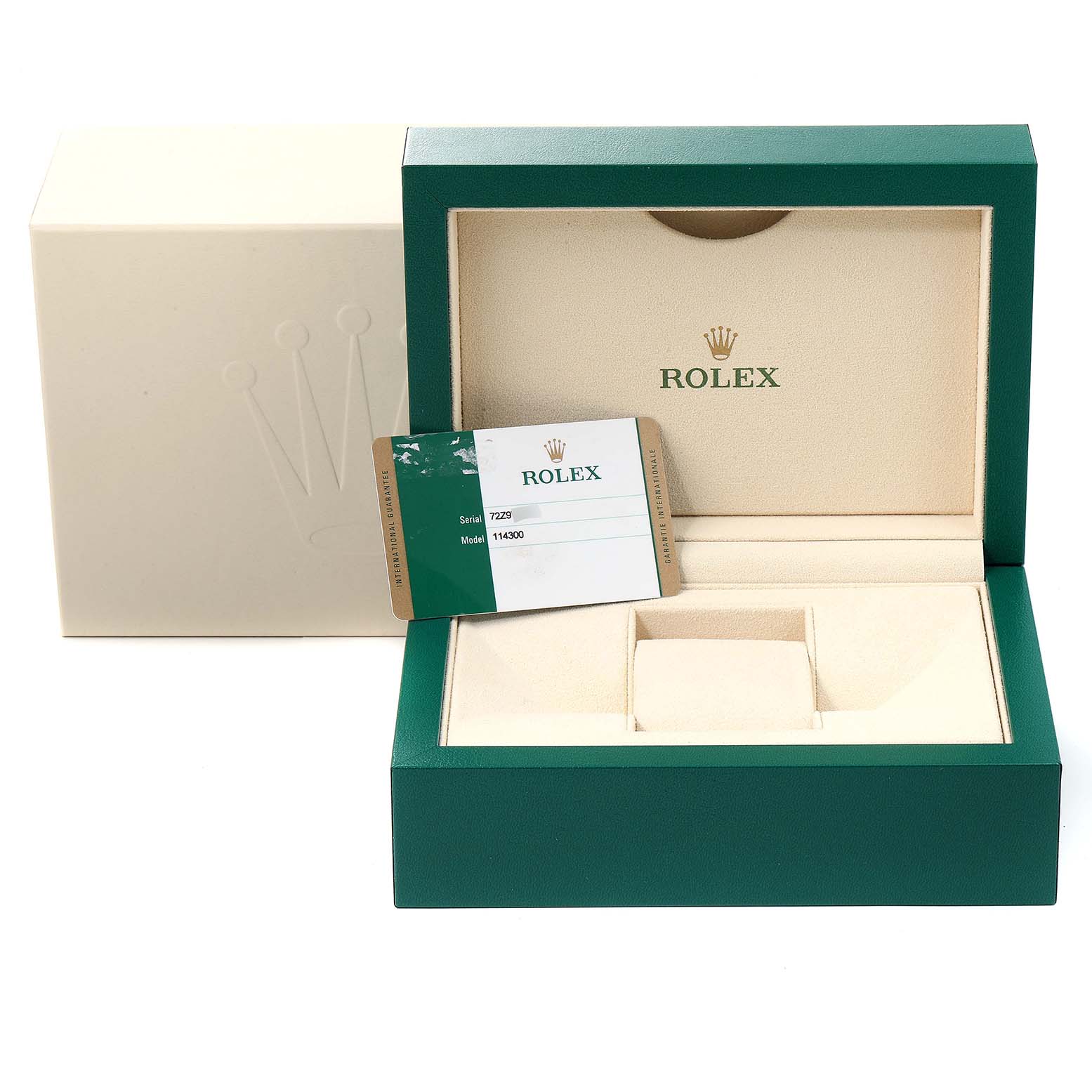The image shows an open Rolex Oyster Perpetual 114300 Men's Stainless Steel Grey Dial 114300 Men's Stainless Steel Grey Dial watch box with a warranty card above the watch slot.