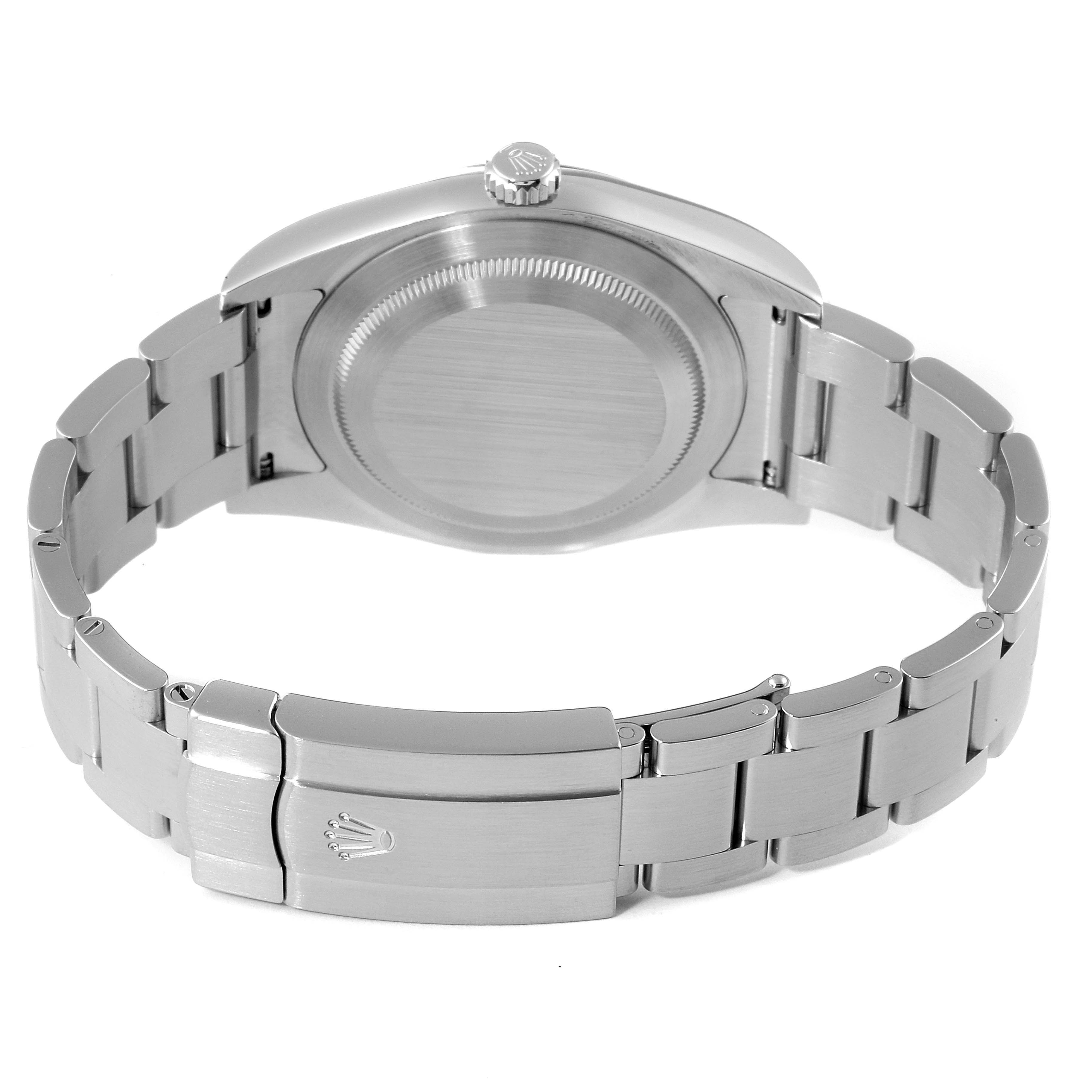 The image shows the back and bracelet of a Rolex Oyster Perpetual 114300 Men's Stainless Steel Burgundy Dial 114300 Men's Stainless Steel Burgundy Dial watch, highlighting its clasp and caseback.