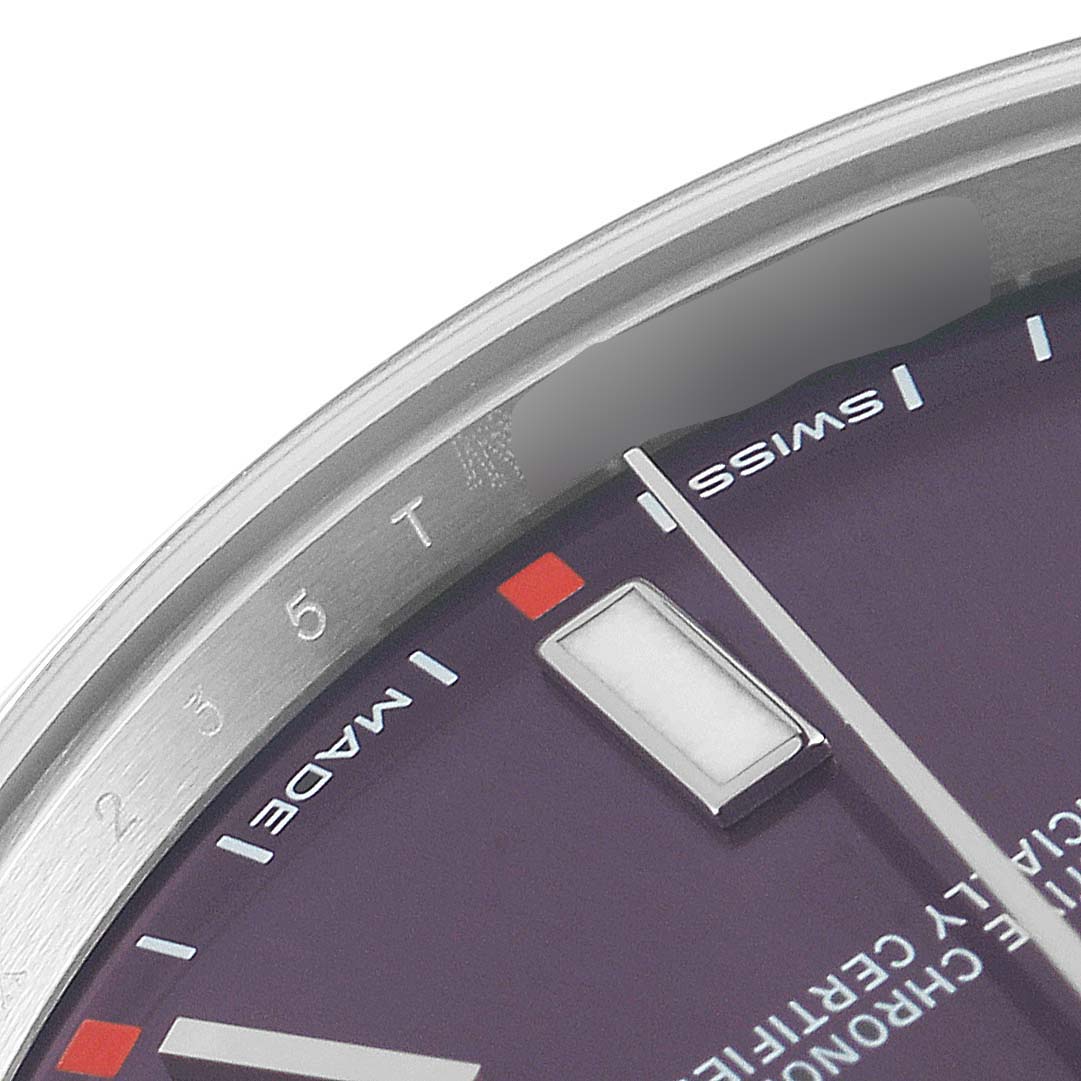 The image shows a close-up of the dial and bezel of a Rolex Oyster Perpetual 114300 Men's Stainless Steel Burgundy Dial 114300 Men's Stainless Steel Burgundy Dial watch, focusing on the "Swiss Made" text and hour markers.