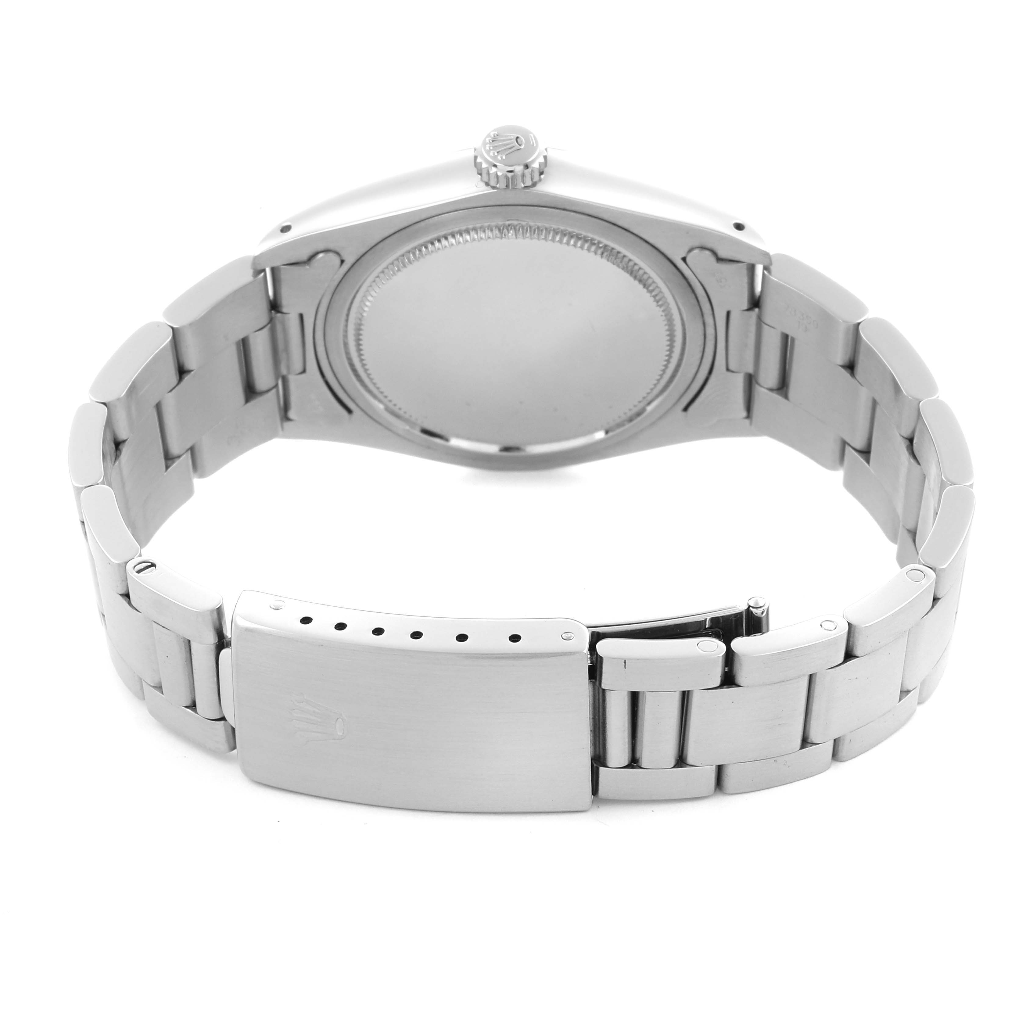 The image shows the back of a Rolex Vintage Collection 6694 Men's Stainless Steel Silver Dial 6694 Men's Stainless Steel Silver Dial watch, highlighting the bracelet, clasp, and case back.