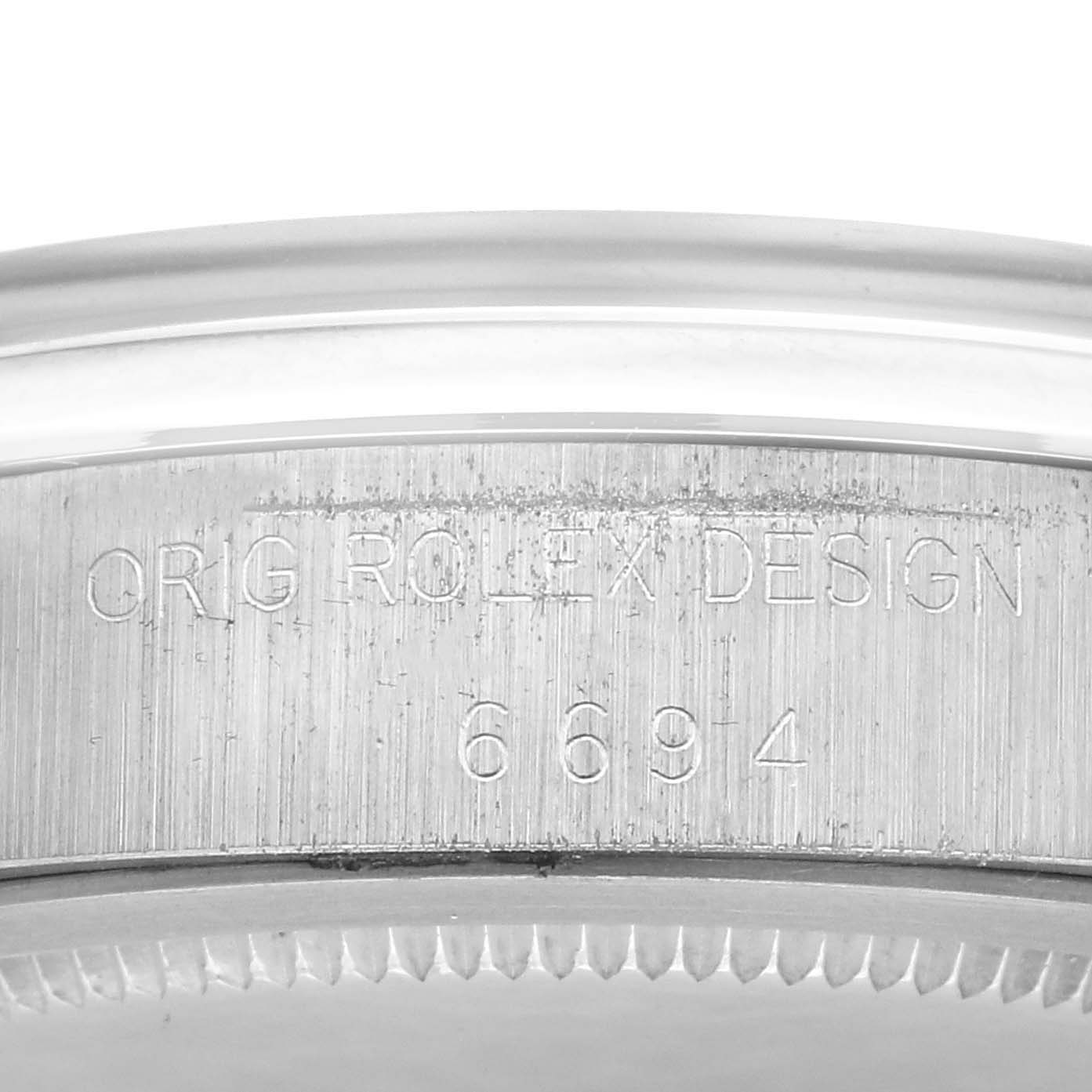 The image shows the side view of the caseback, highlighting the engraved model number of the Rolex Vintage Collection 6694 Men's Stainless Steel Silver Dial 6694 Men's Stainless Steel Silver Dial watch.