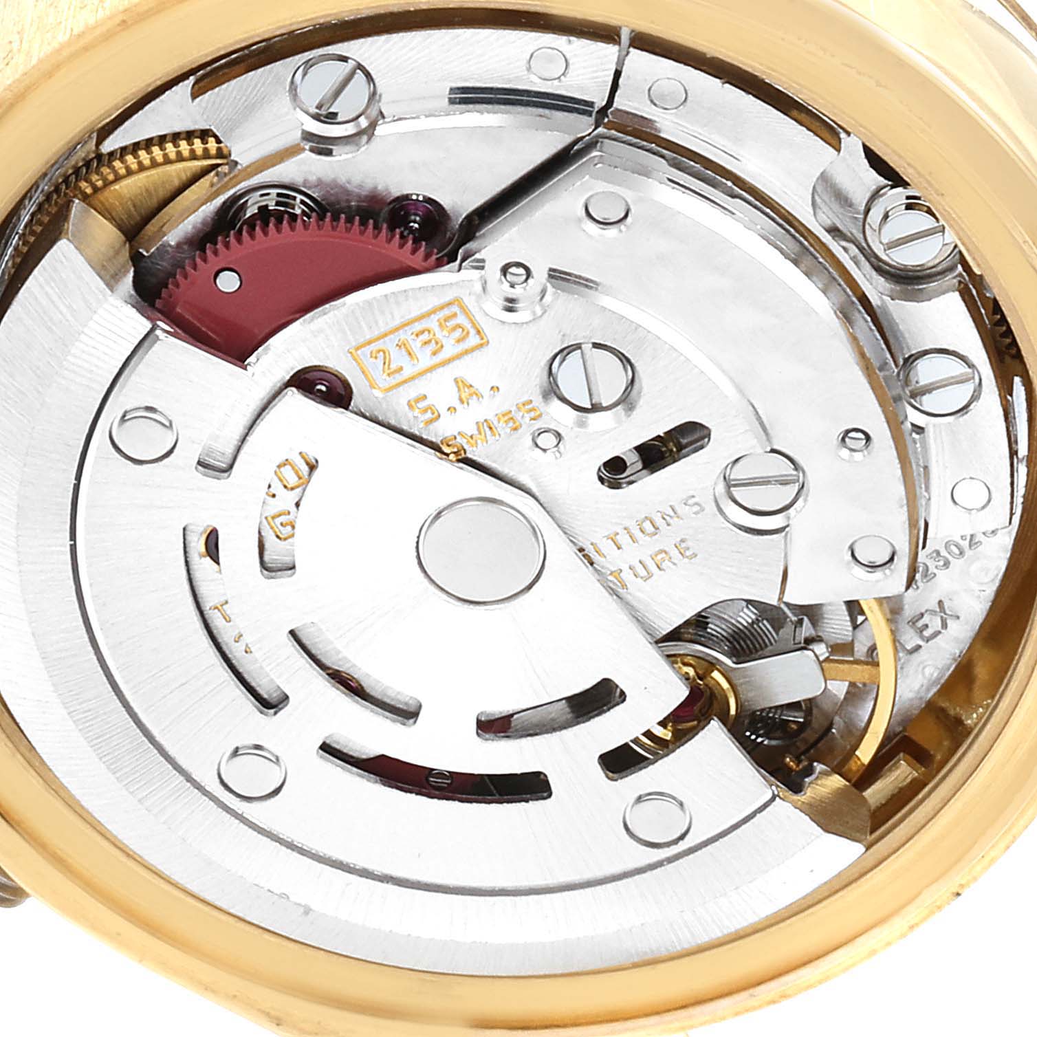 This image shows the intricate inner movement of the Rolex President 69178 Women's Yellow Gold Champagne Dial 69178 Women's Yellow Gold Champagne Dial model watch from a close-up angle.