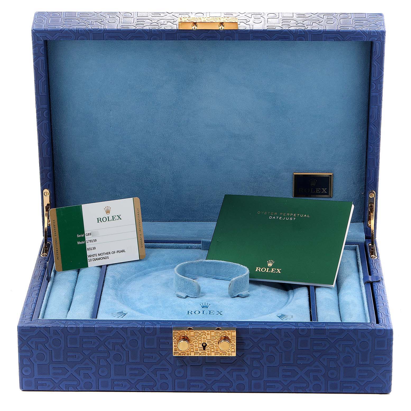 The image shows the opened packaging box of a Rolex President 179159 Women's White Gold Mother of Pearl Dial 179159 Women's White Gold Mother of Pearl Dial model, including the warranty card and instruction booklet.