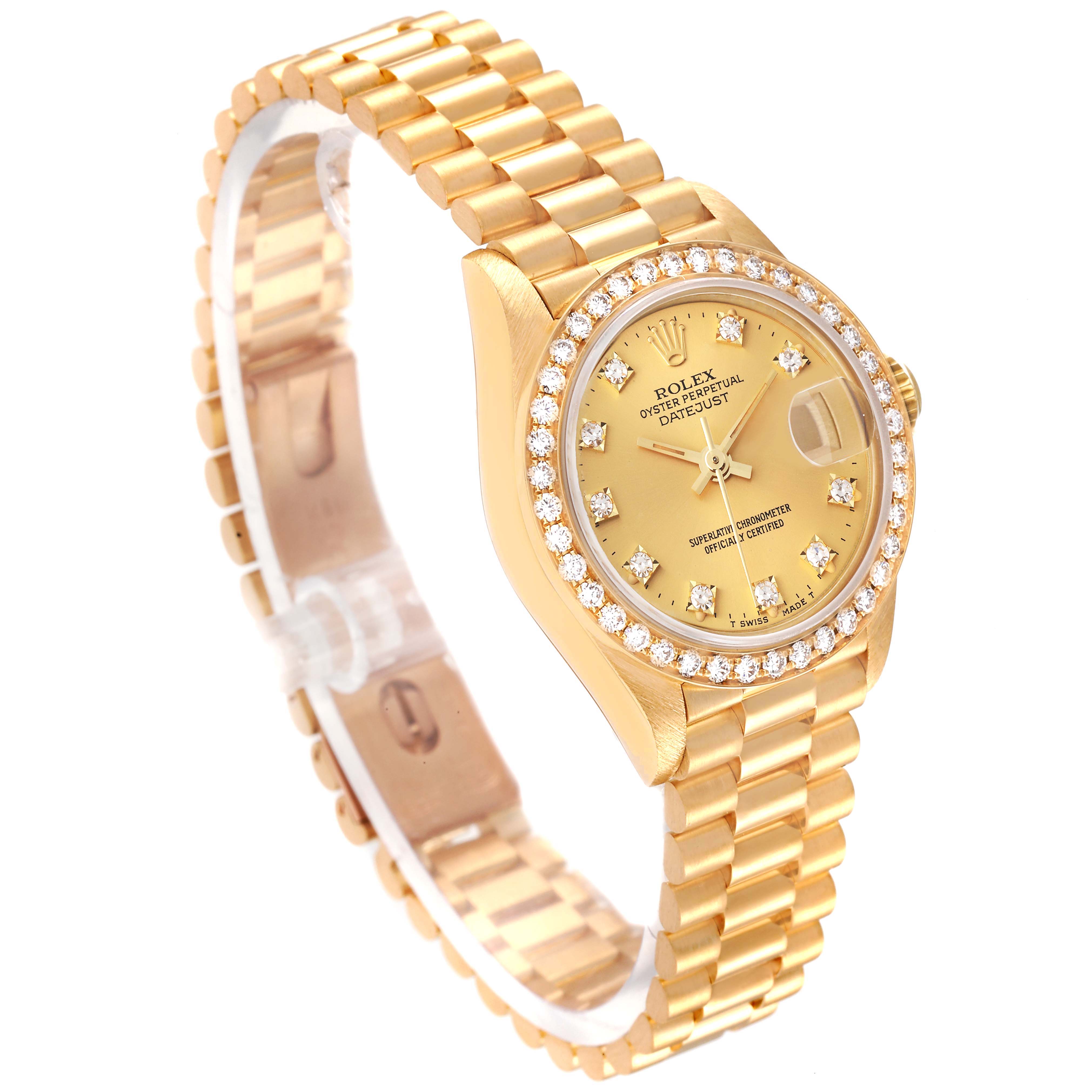 The Rolex President 69138 Women's Yellow Gold Champagne Dial 69138 Women's Yellow Gold Champagne Dial model watch is shown at a tilted angle, showcasing its gold bracelet, diamond bezel, and face.