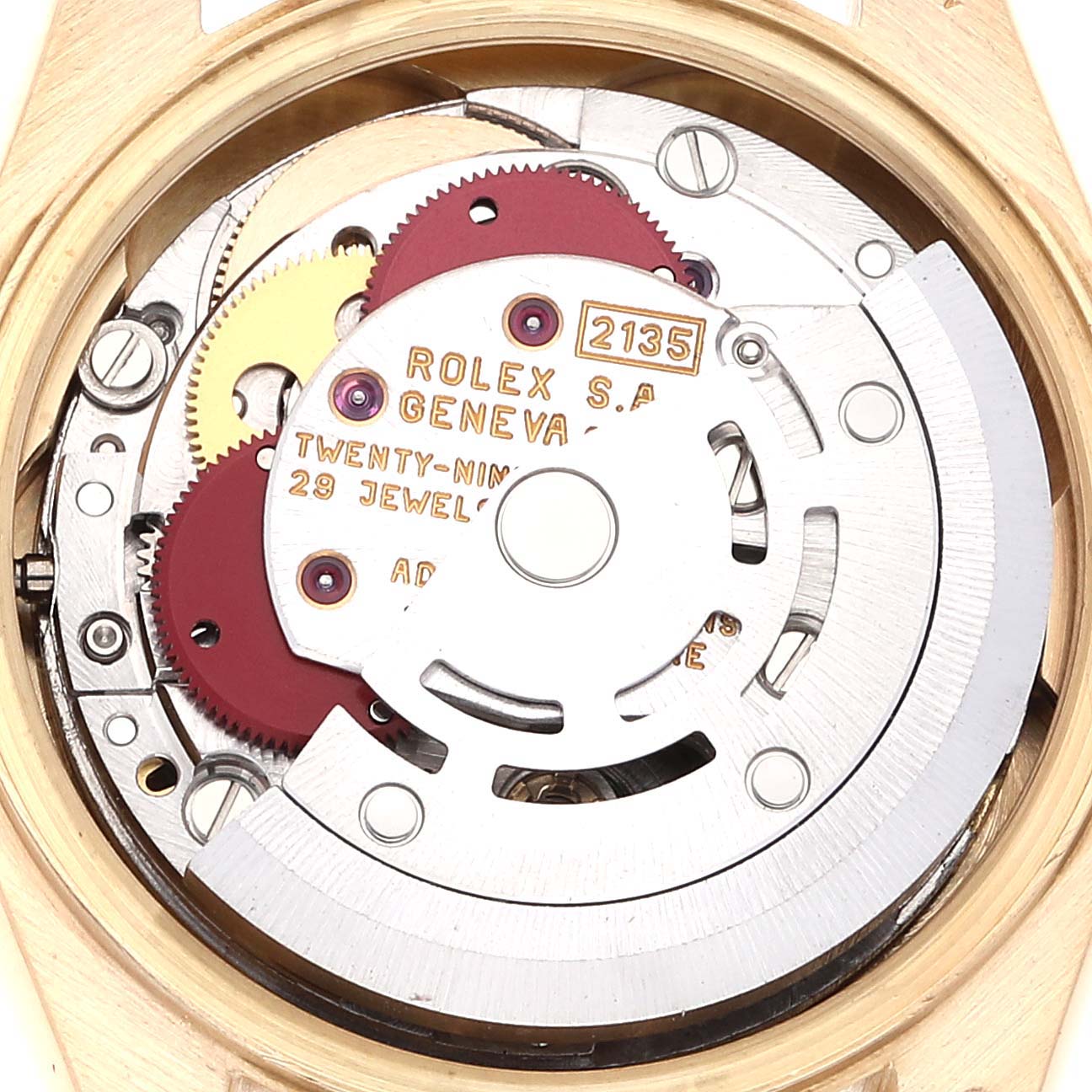 This is a close-up view of the internal mechanism of a Rolex President 69138 Women's Yellow Gold Champagne Dial 69138 Women's Yellow Gold Champagne Dial model watch, showcasing gears and jewels.