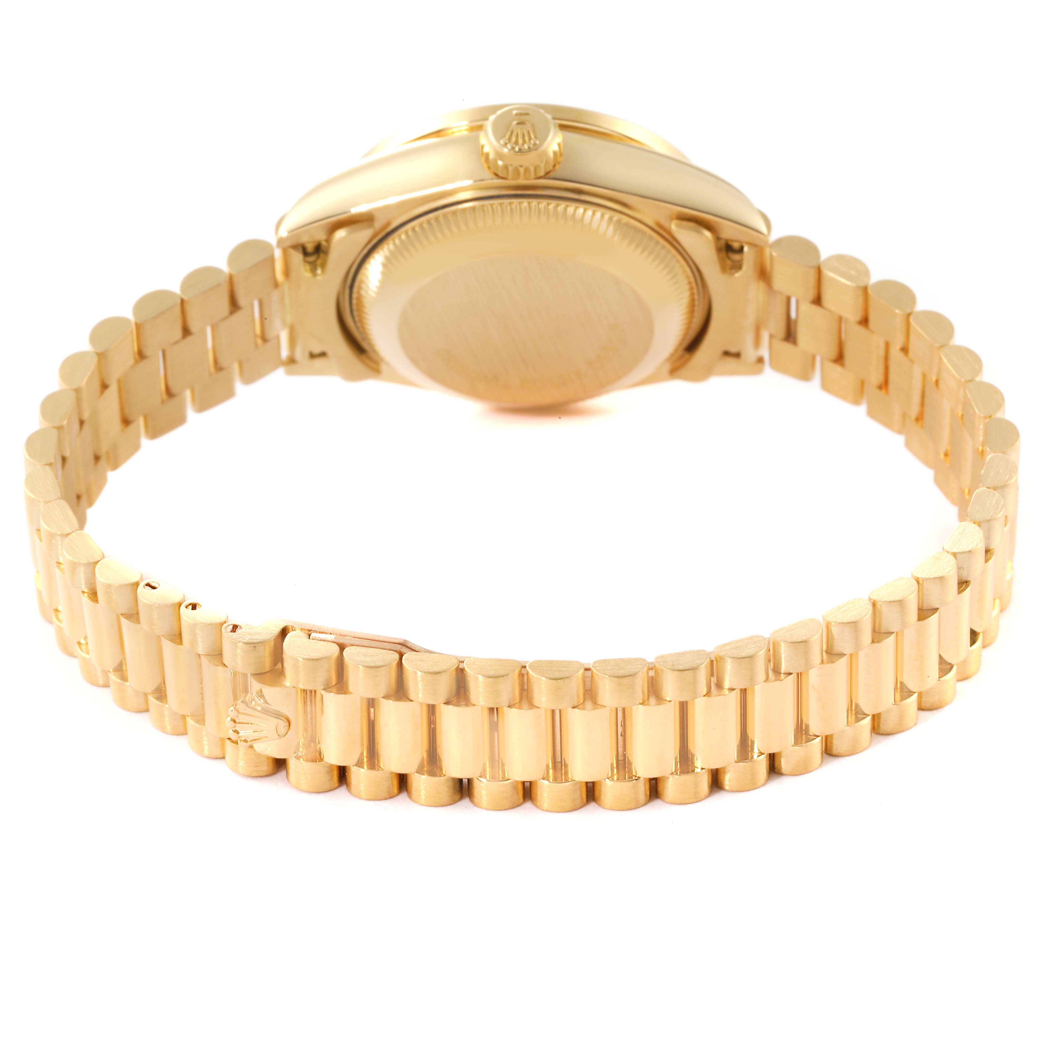 The image shows the back view of a Rolex President 69138 Women's Yellow Gold Champagne Dial 69138 Women's Yellow Gold Champagne Dial model watch, focusing on the gold bracelet and the case back.