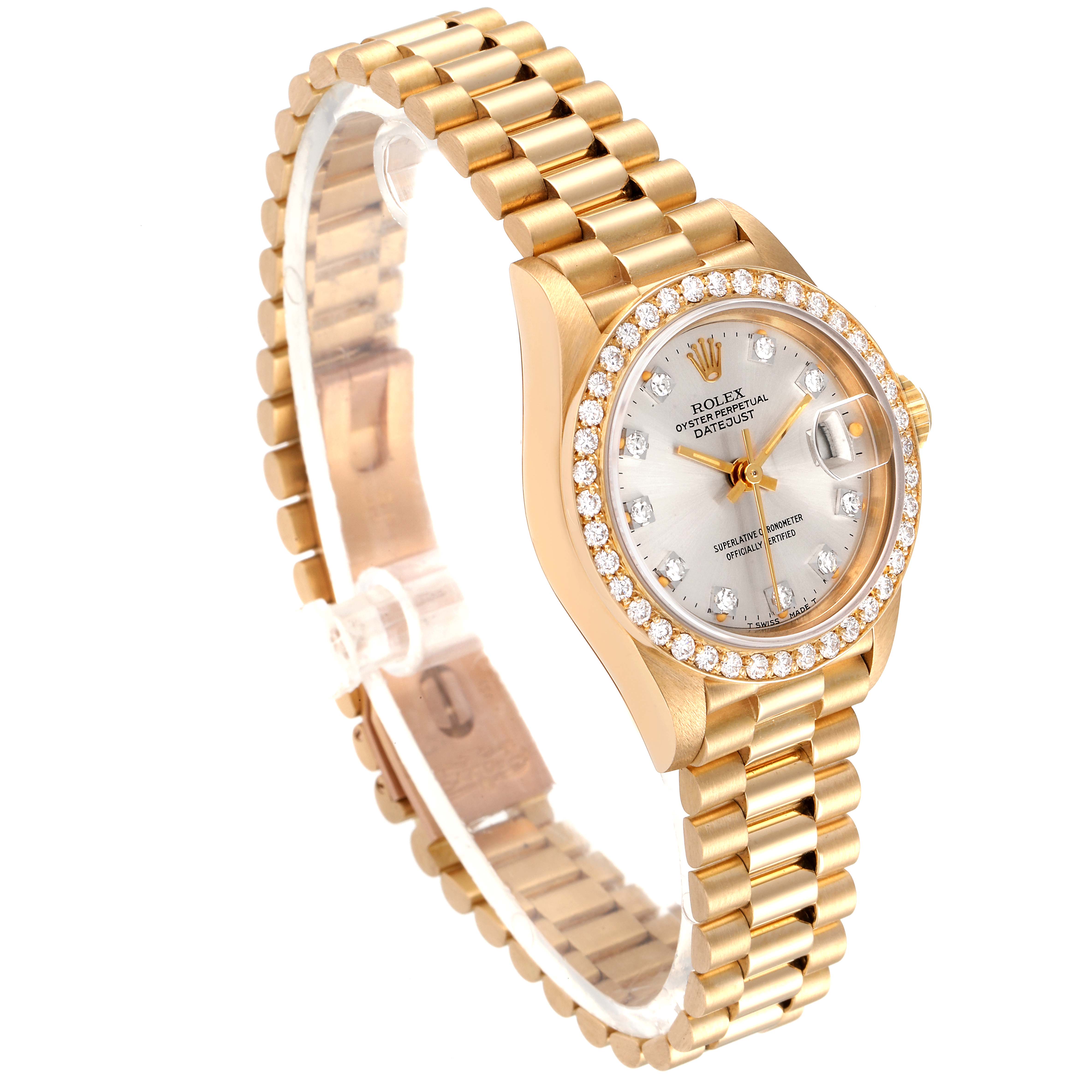 The watch is a Rolex President 69138 Women's Yellow Gold Silver Dial 69138 Women's Yellow Gold Silver Dial model, shown at an angle displaying the dial, bezel, and bracelet.