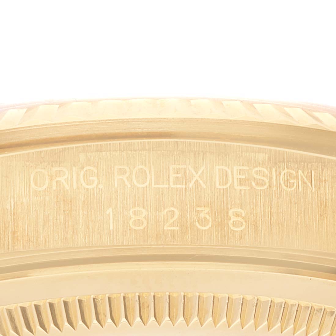 This close-up image shows the side view of the case back of a Rolex President 18238 Men's Steel and Gold (two tone) Champagne Dial 18238 Men's Steel and Gold (two tone) Champagne Dial model, with engravings visible.