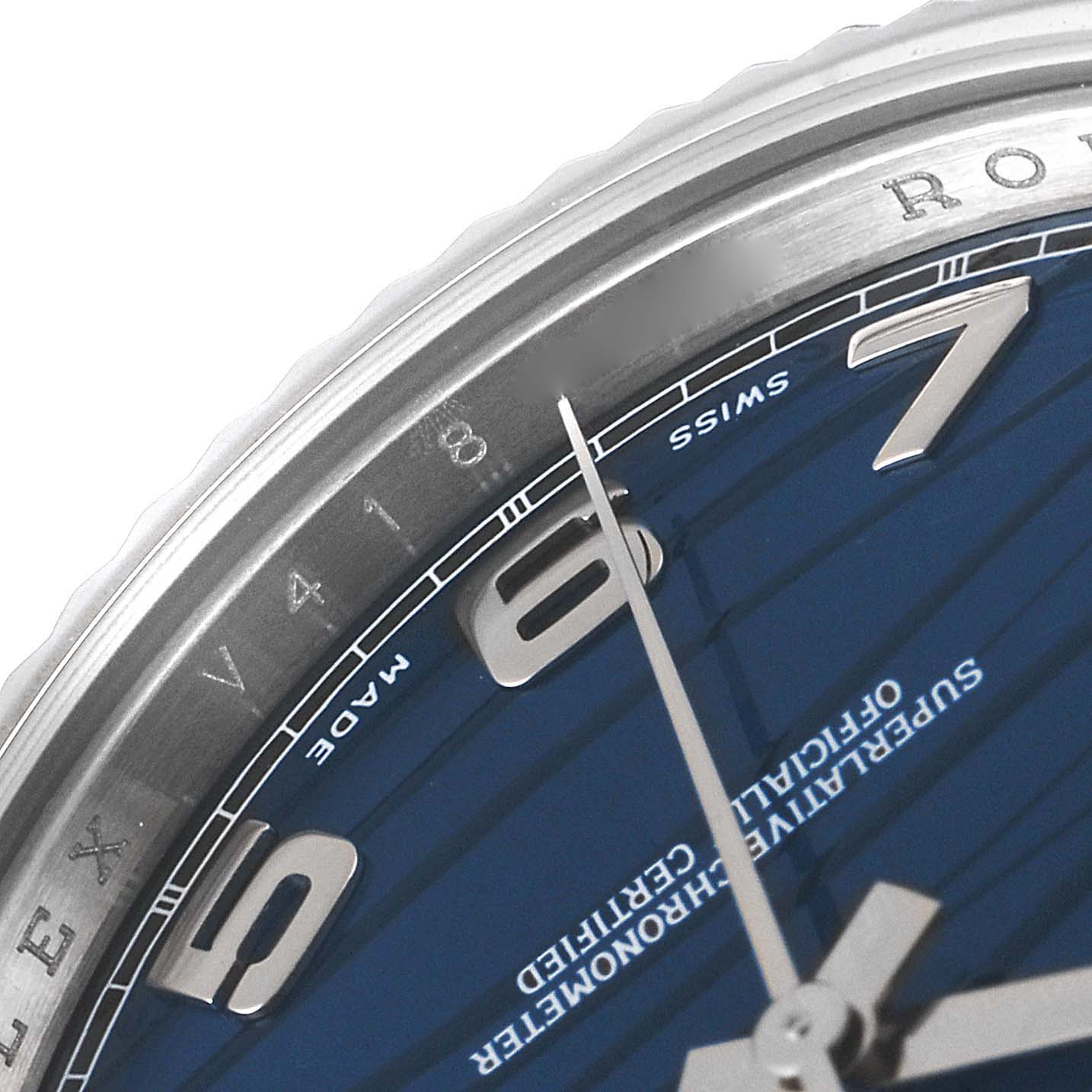 The image shows a close-up of the dial, hands, and part of the bezel of a Rolex President 218239 Men's White Gold Blue Dial 218239 Men's White Gold Blue Dial model watch.