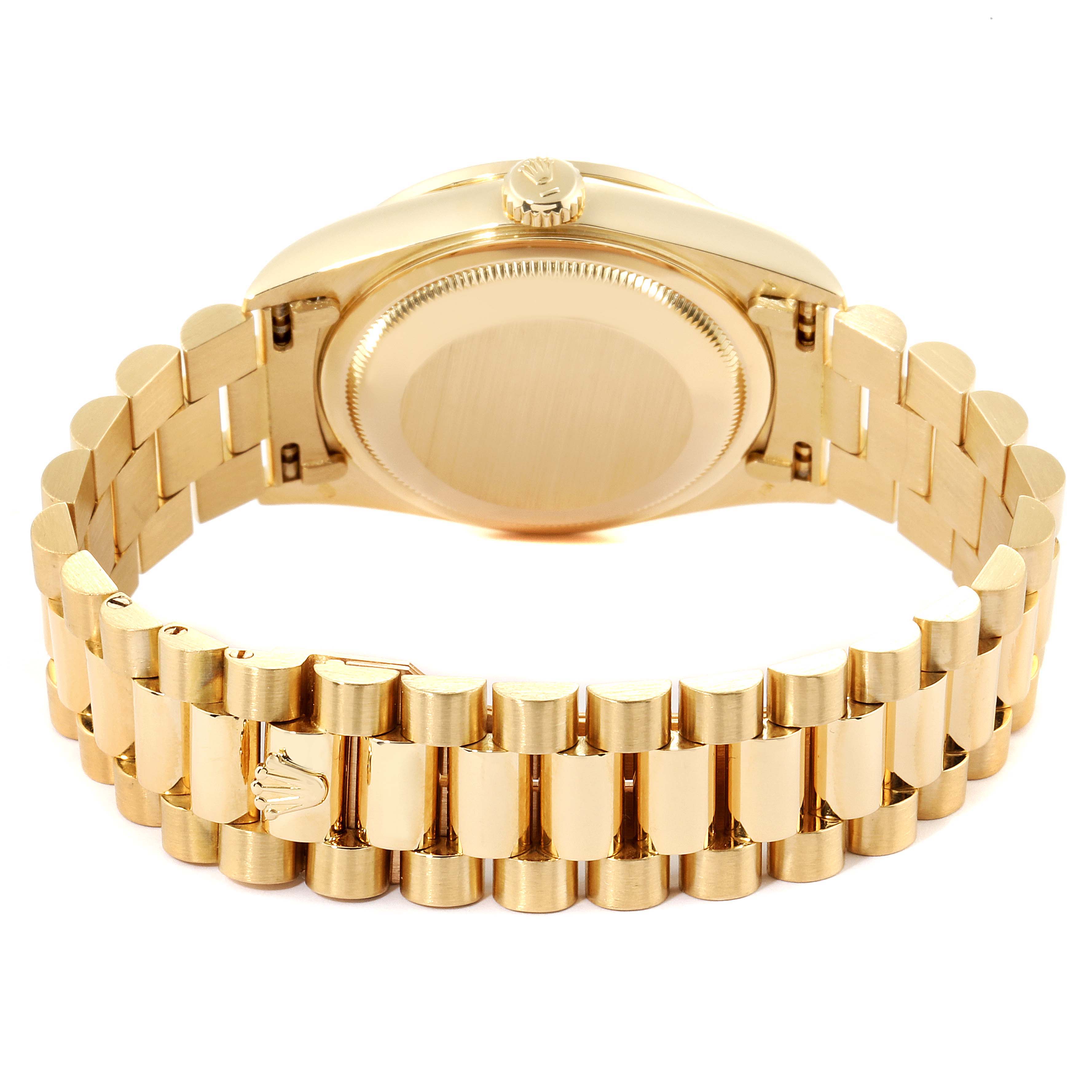 This image shows the back case and bracelet clasp of a Rolex President 18388 Men's Yellow Gold Champagne Dial 18388 Men's Yellow Gold Champagne Dial model watch, viewed from the rear.
