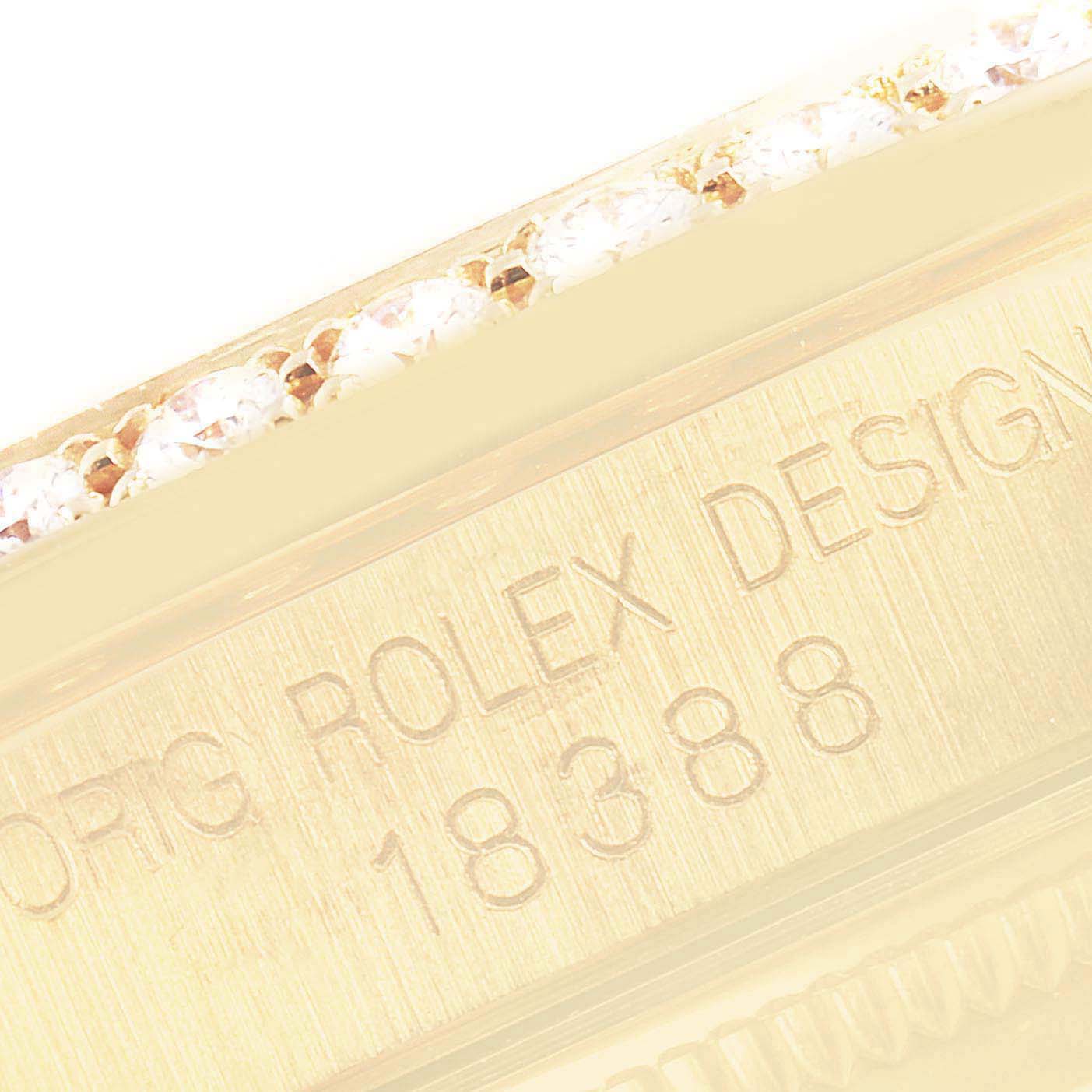 This image shows the edge of a Rolex President 18388 Men's Yellow Gold Champagne Dial 18388 Men's Yellow Gold Champagne Dial model watch, highlighting the engraved model number and diamond-set bezel.